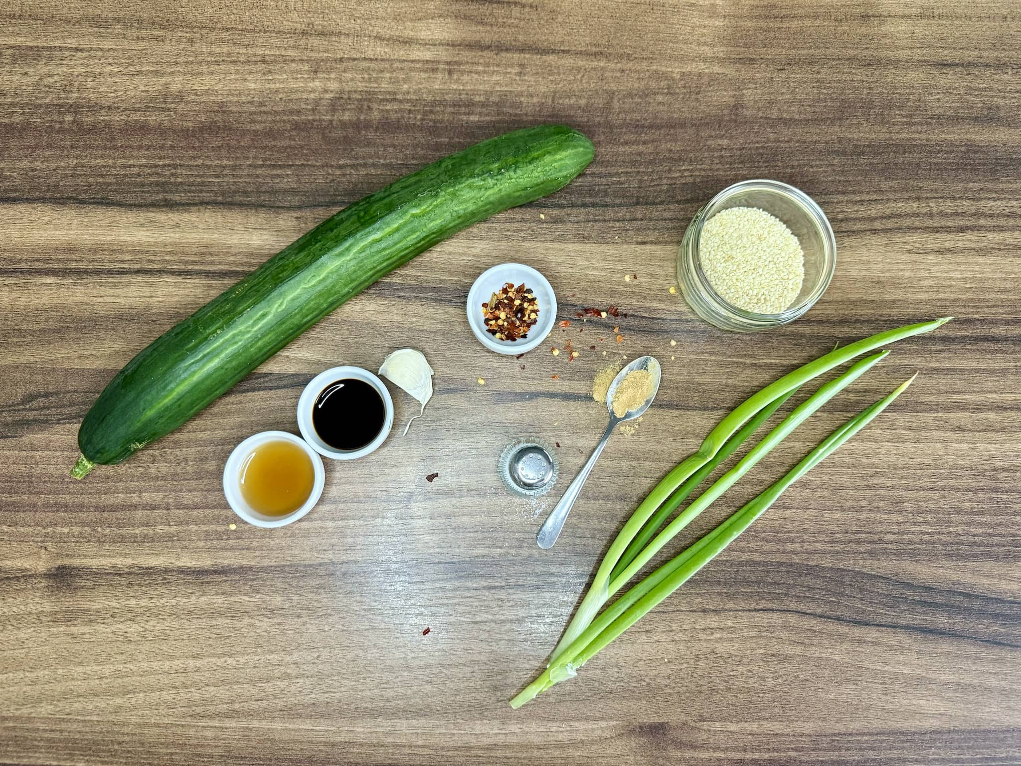 Ingredients on the tabletop ready to make Asian-Style Cucumber Salad