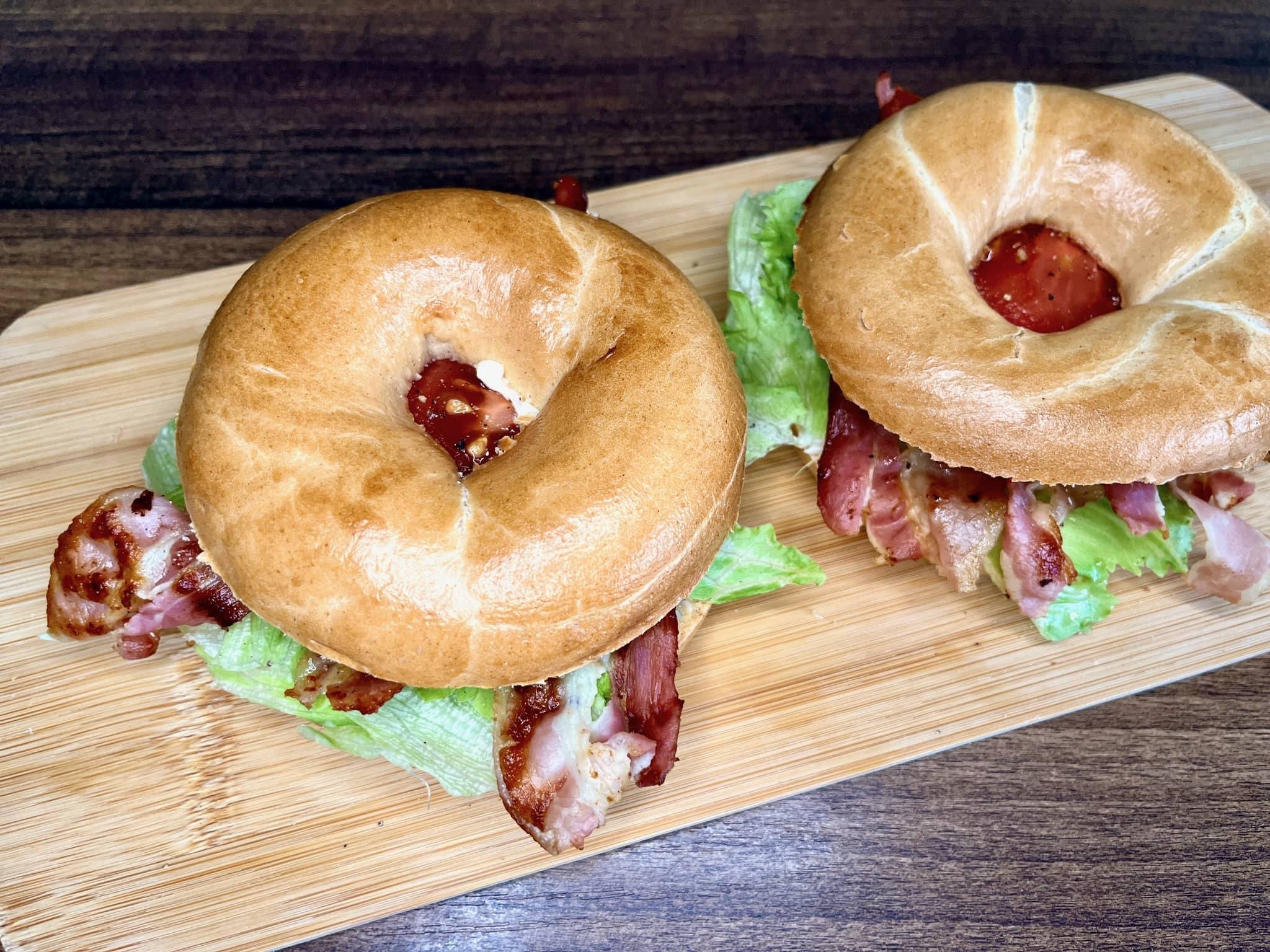 Finished BLT Bagel sanditches on a chopping board
