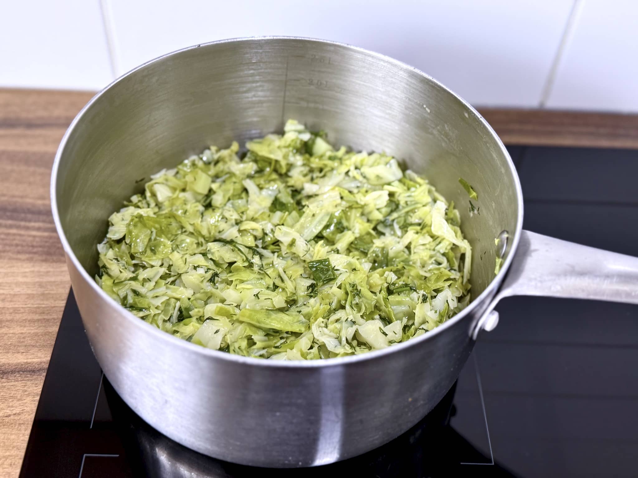 Ready-made Braised Young Cabbage with Dill still in a pan