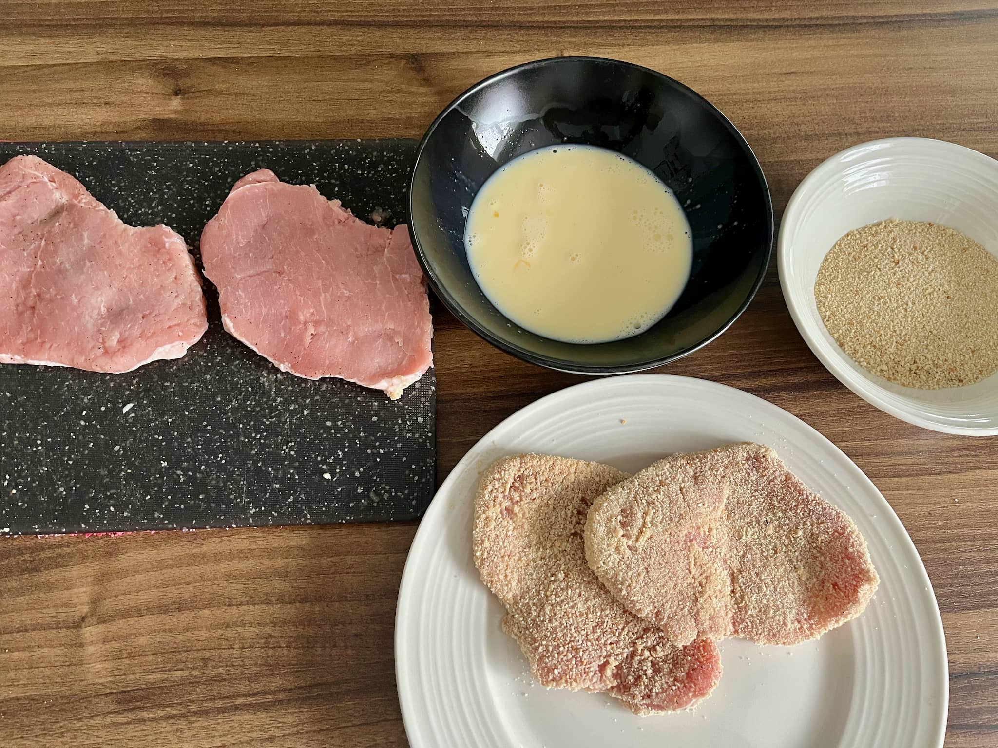 Pork loins, egg mixture, breadcrumb