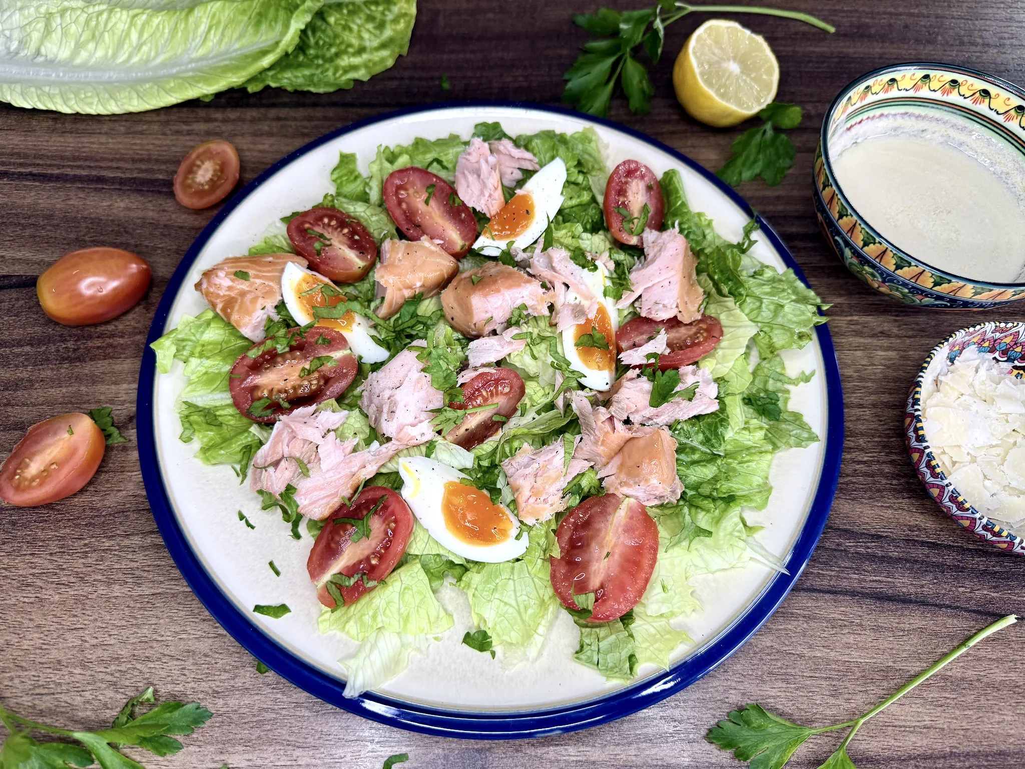 A nicely assembled salad on a serving plate