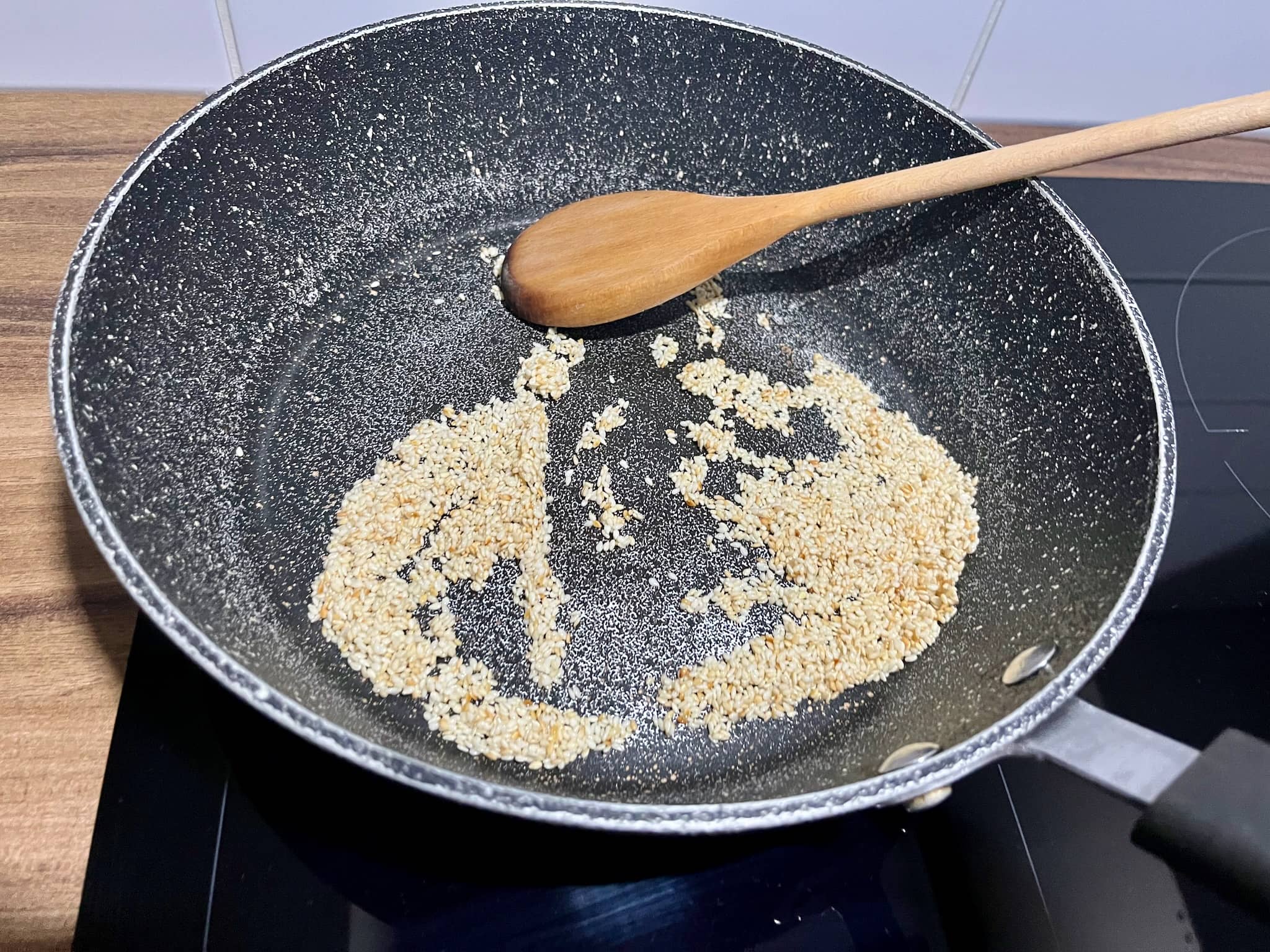 Frying seeds in a pan