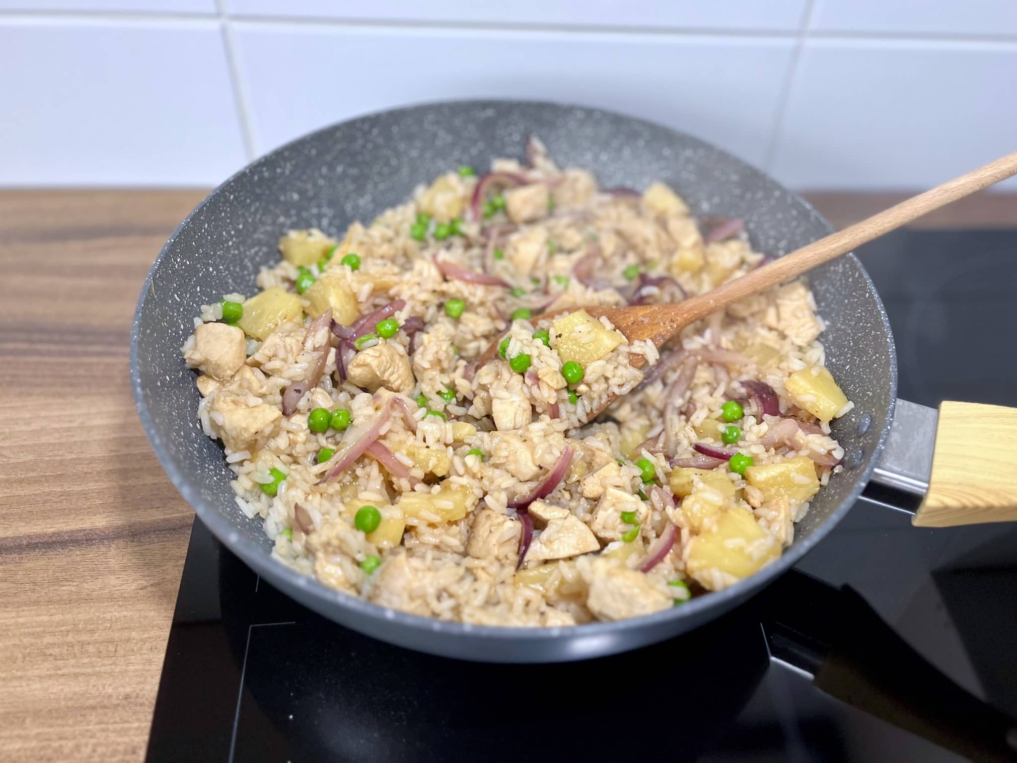 A nicely done pan of chicken and pineapple fried rice