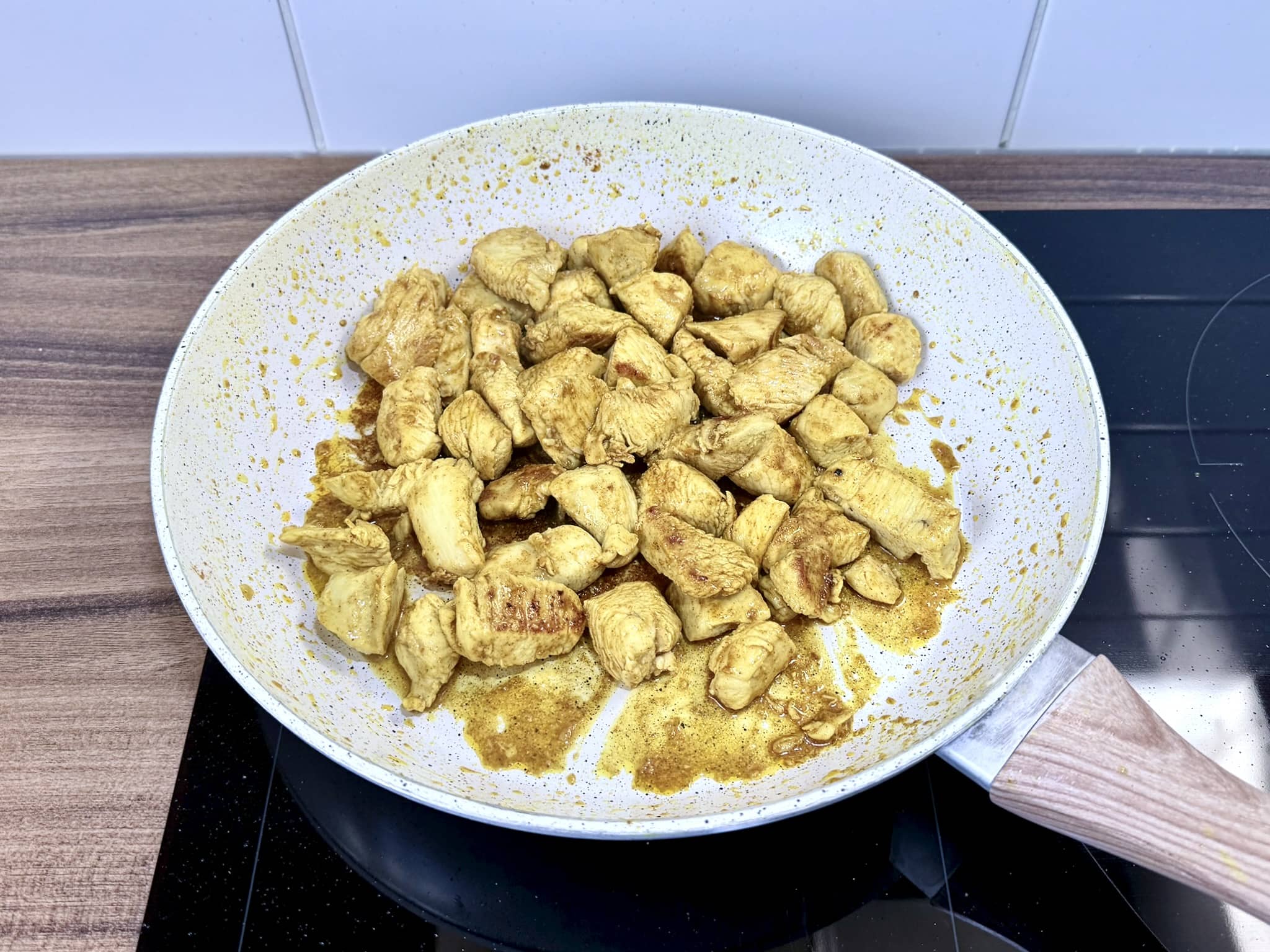 Nicely fried chicken breast pieces coated in seasoning