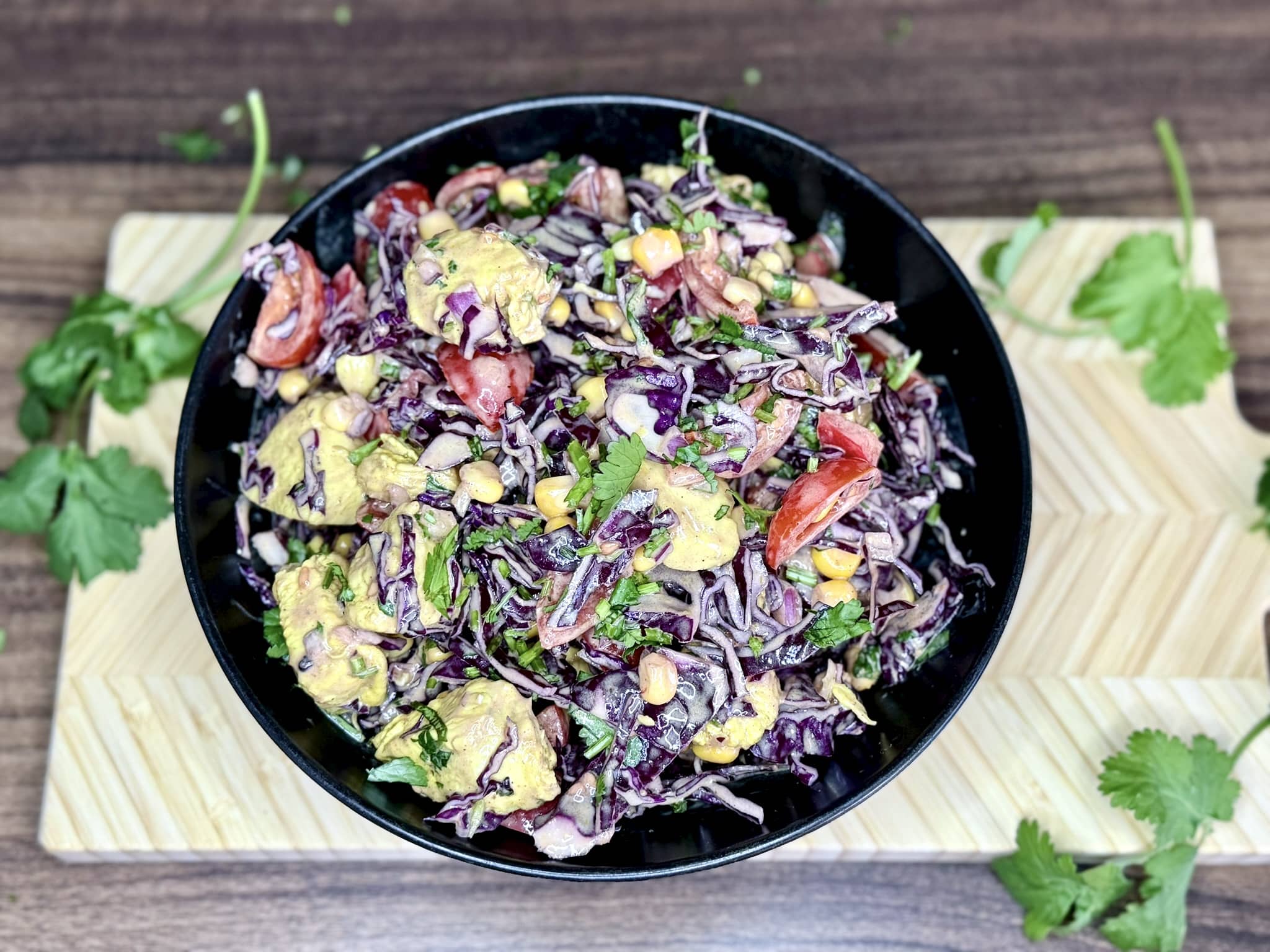 Nicely combined Chicken Kebab Salad with red cabbage in a serving bowl