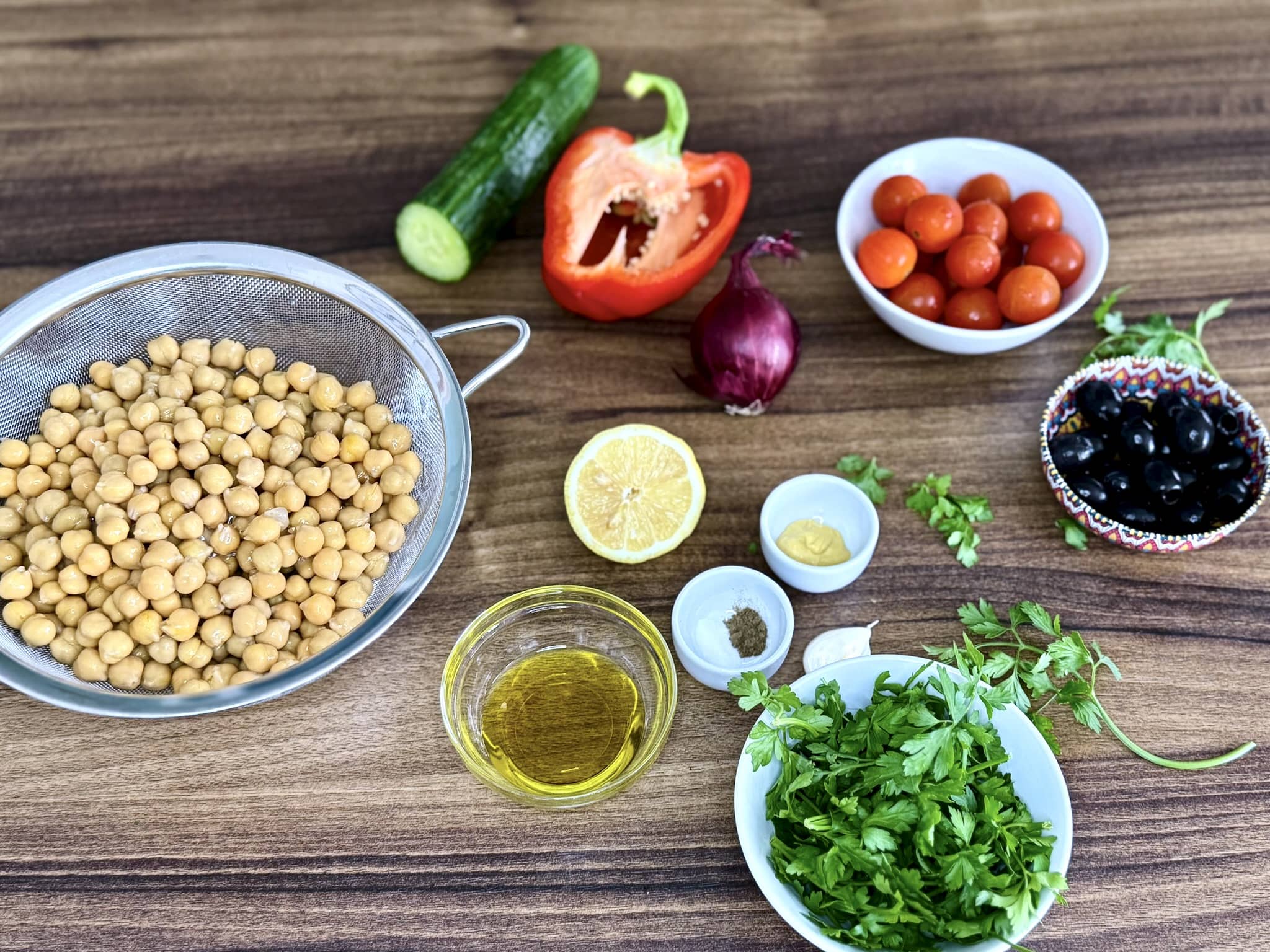 All ingredients on table top ready to make Chickpea Salad