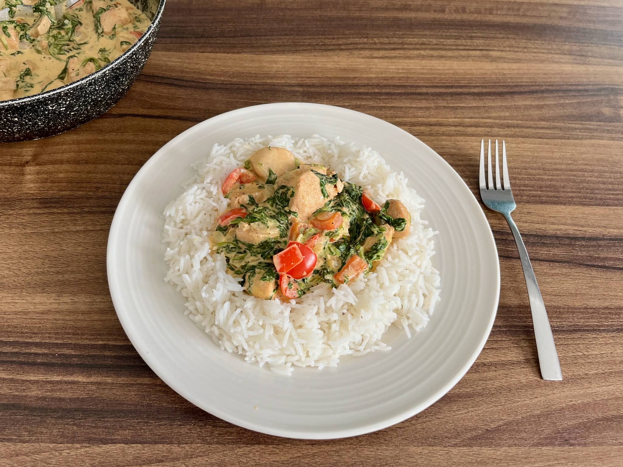 Creamy Chicken with Spinach and Cheese Triangles served with rice