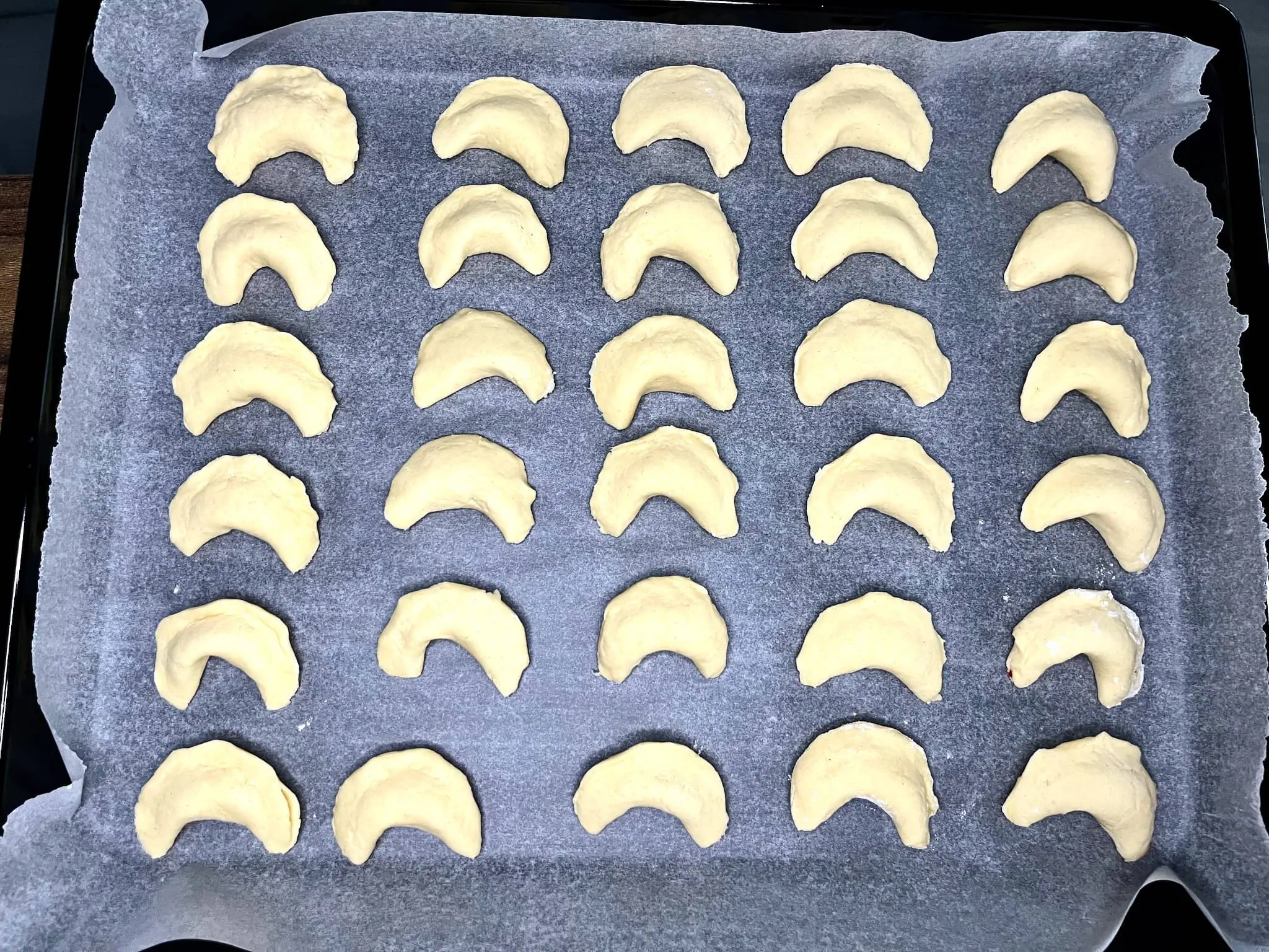 Crispy Cookies with Jam on a tray just before baking