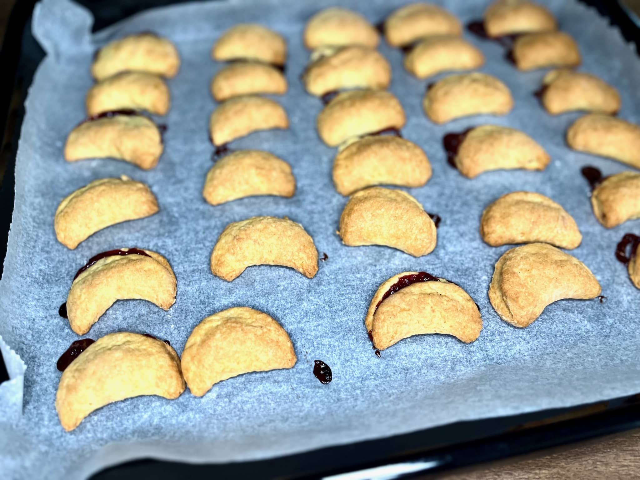 Crispy Cookies with Jam baked, resting on a tray