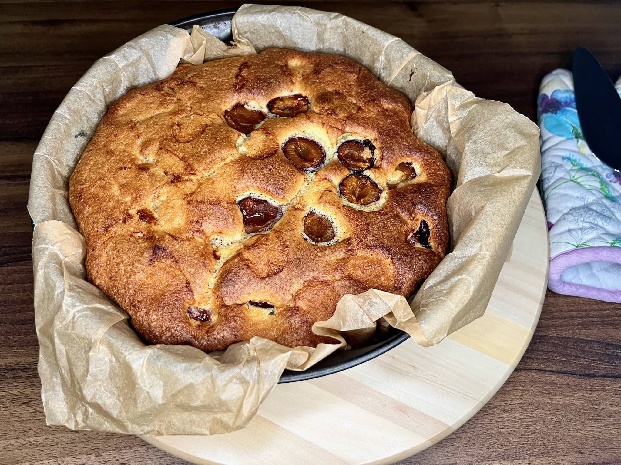 A freshly baked plum sponge cake, straight out of the oven