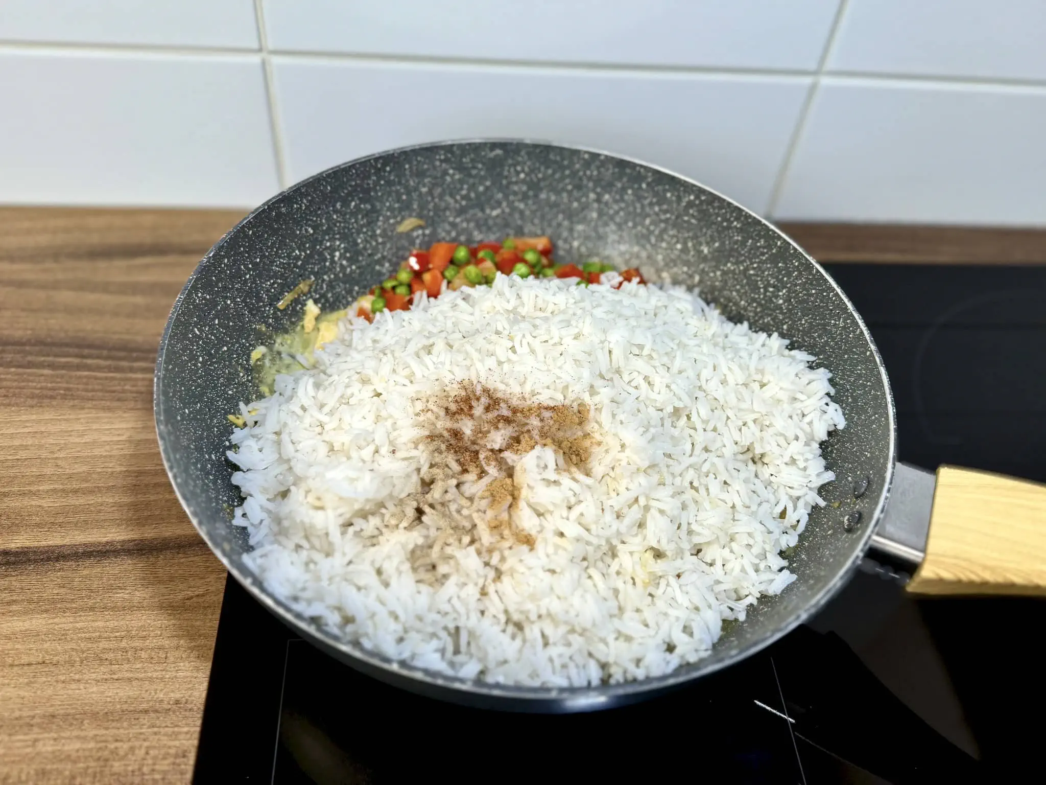Rice added to the pan with the rest of the spices