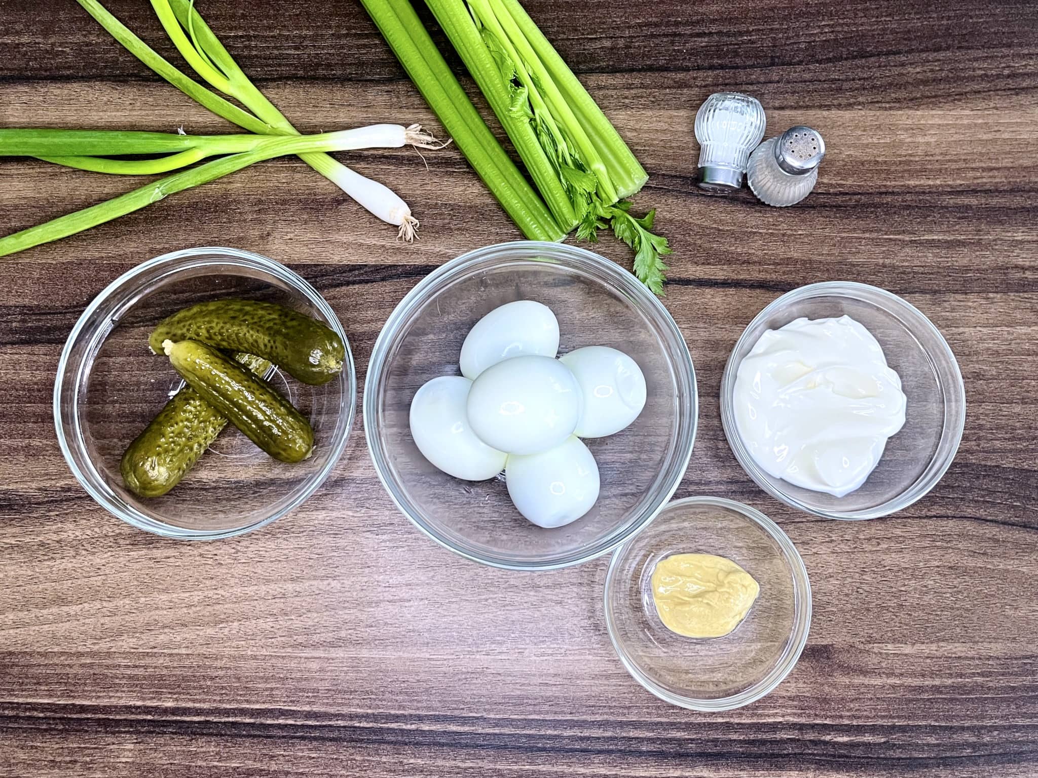 All ingredients on the tabletop ready to make Egg Mayo with Gherkins Sandwich Filling