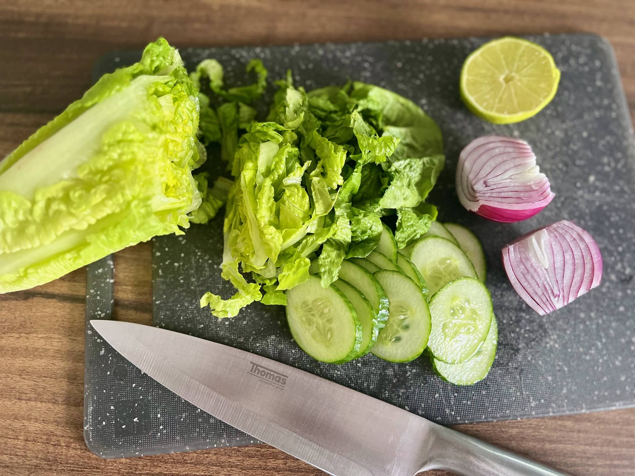 Sliced vegetables on a chopping board