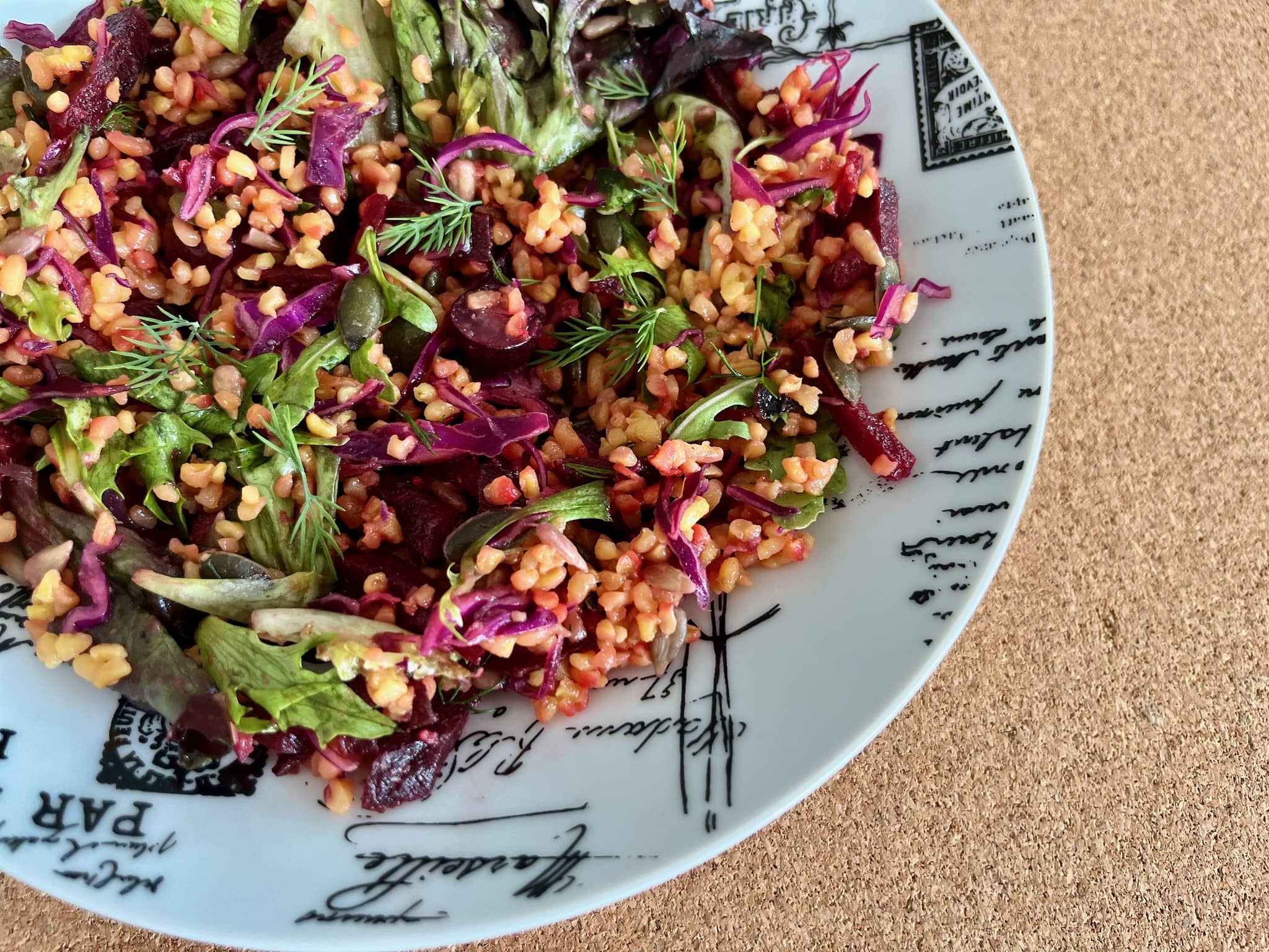 Grainy beetroot and bulgur salad on a plate