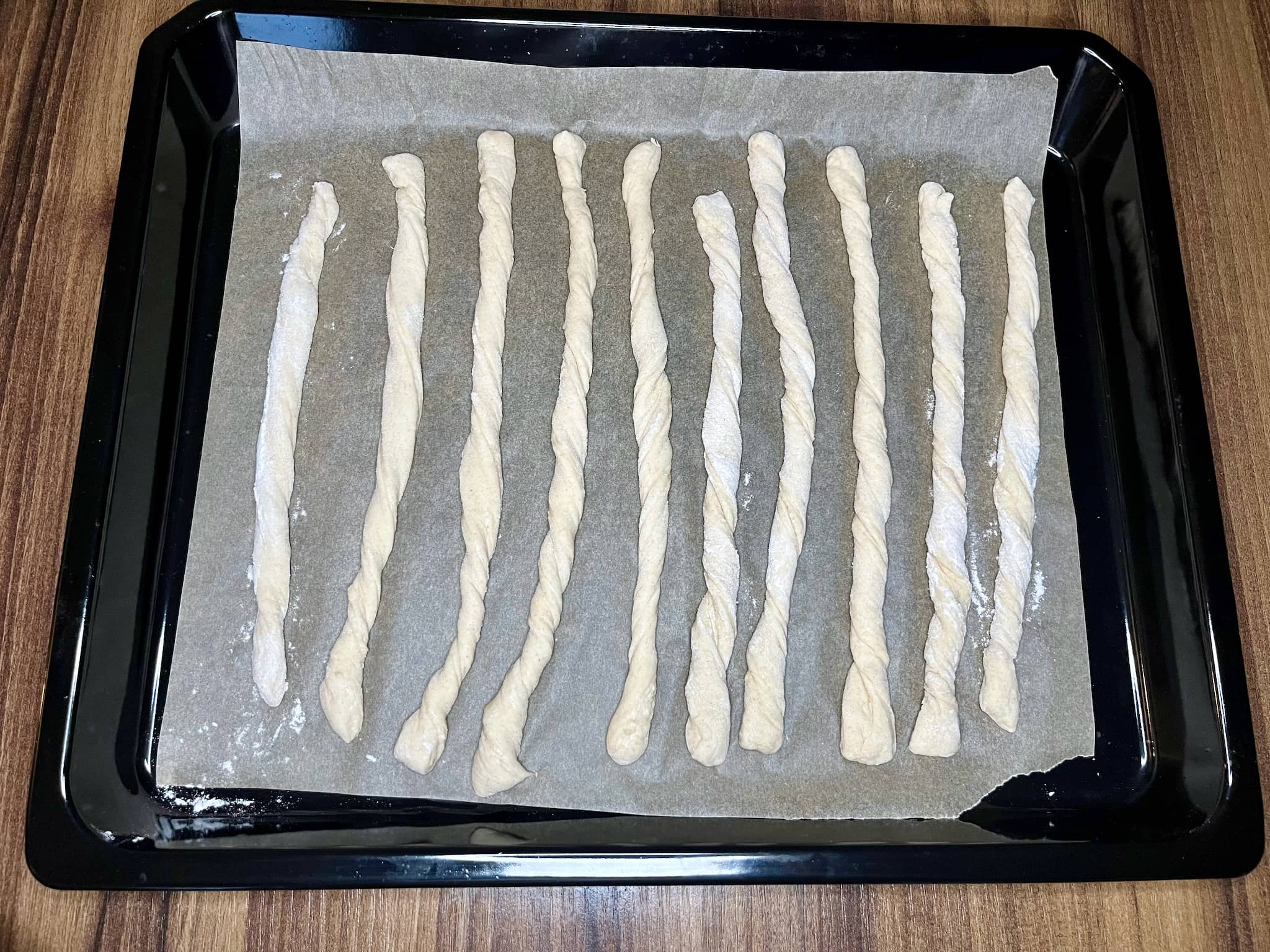 Breadsticks dough on the baking tray