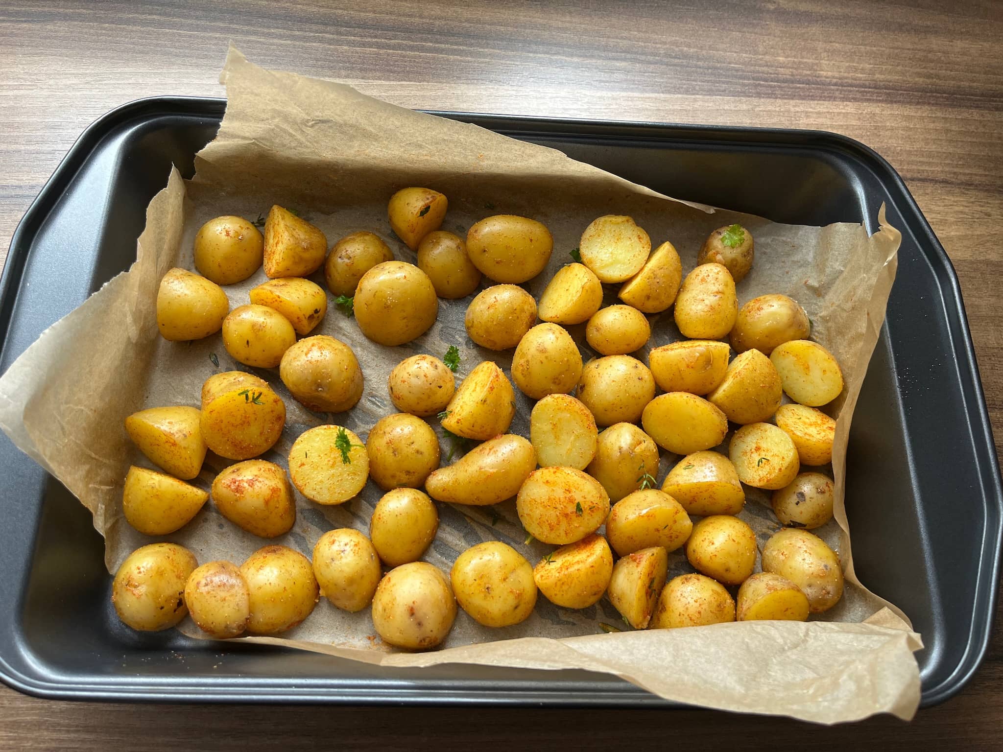 New Potatoes on a baking tray just before baking