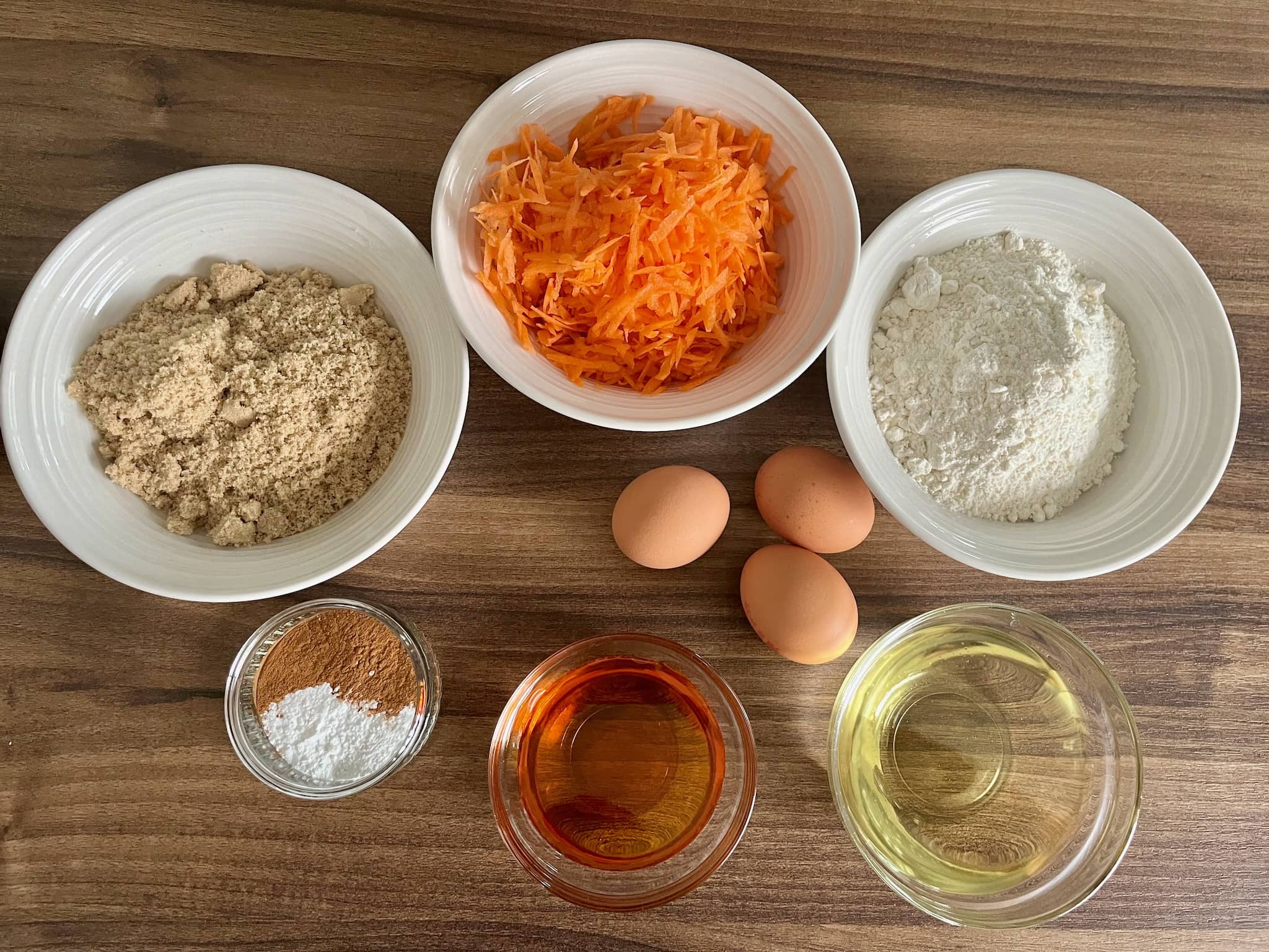 All the ingredients are on the table, ready to make carrot cake