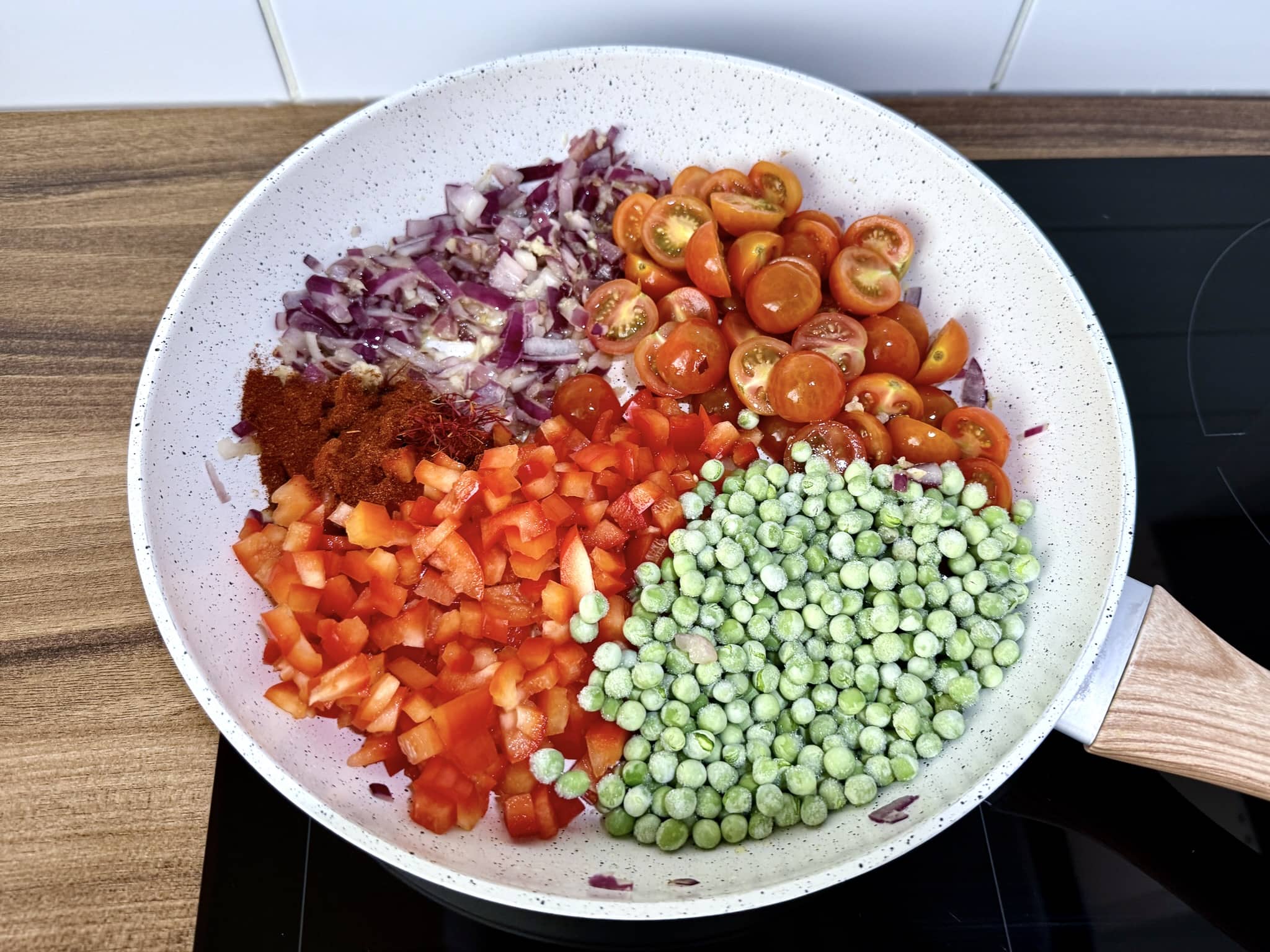 All base ingredients in the pan, ready to make paella