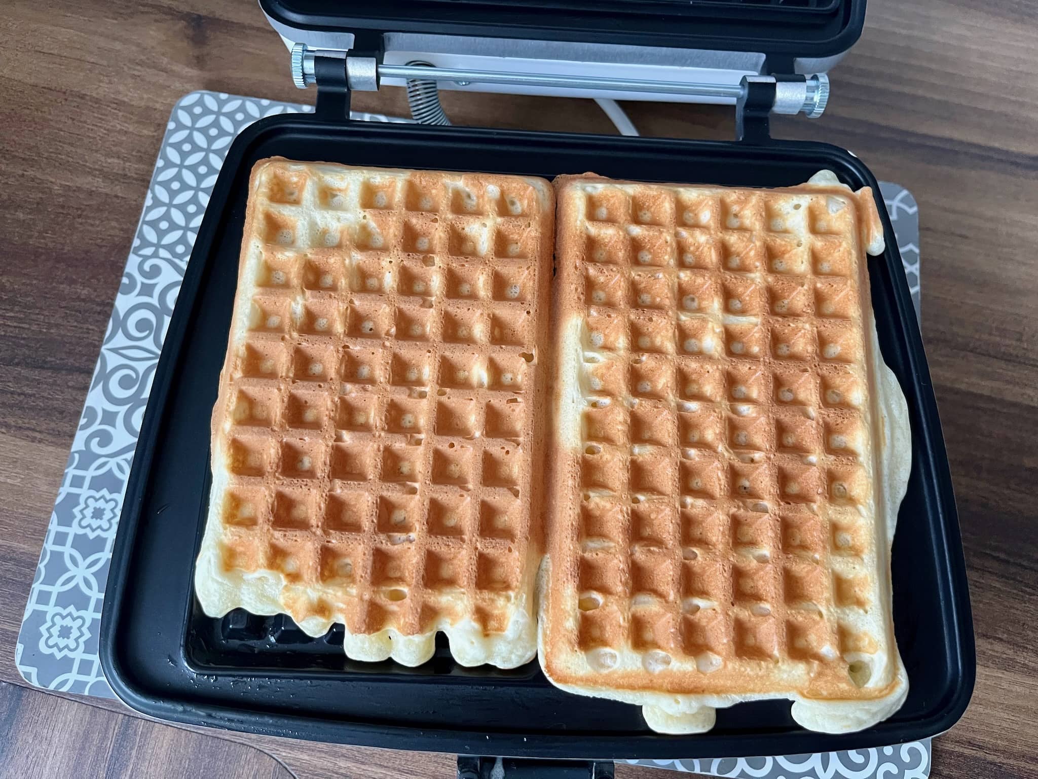 Waffles ready to be taken out from the waffle maker