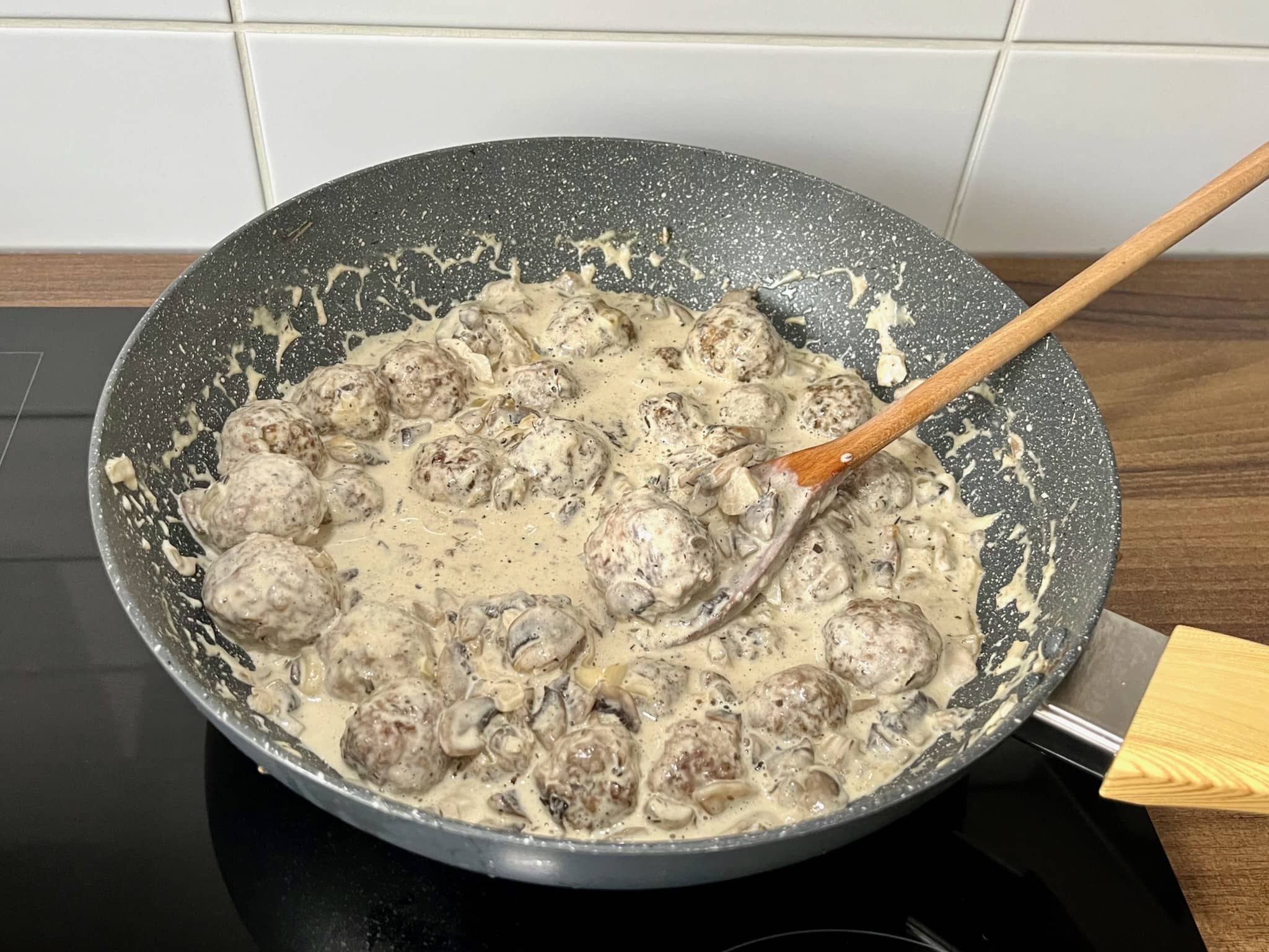 Meatballs added to sauce