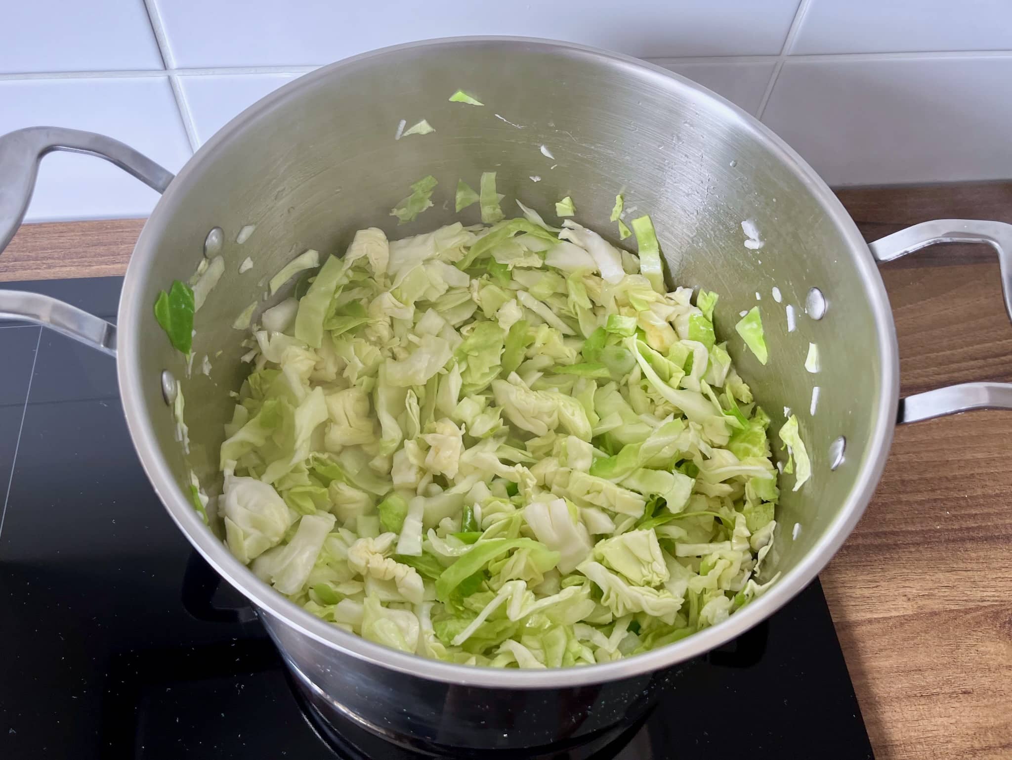 Chopped British sweetheart Cabbage in a pan
