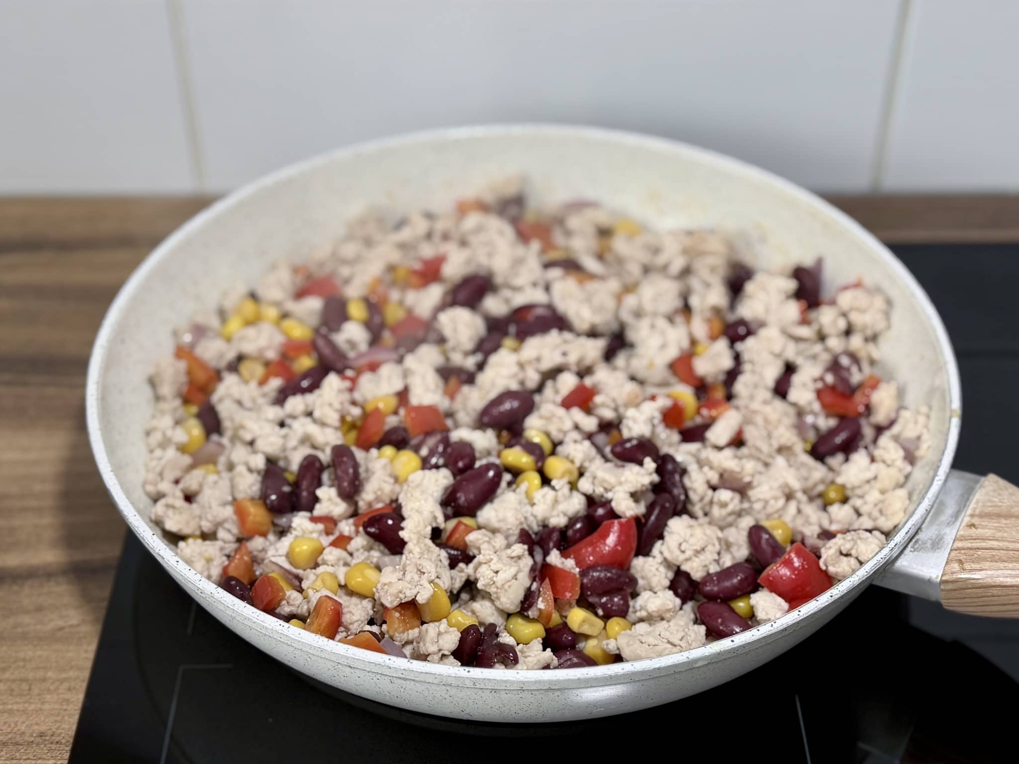 Frying all ingredients together in a skillet