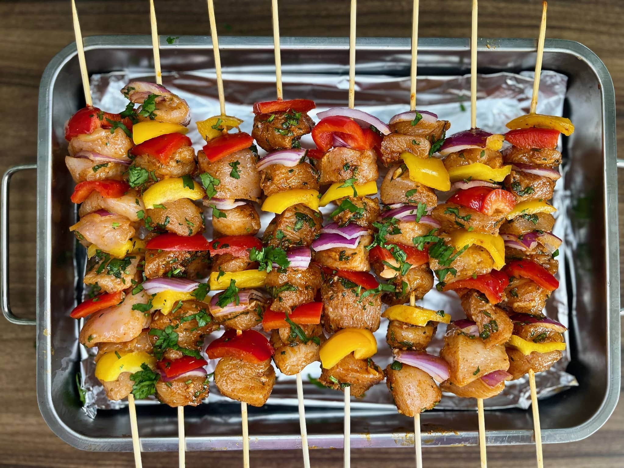 Chicken skewers ready to be baked