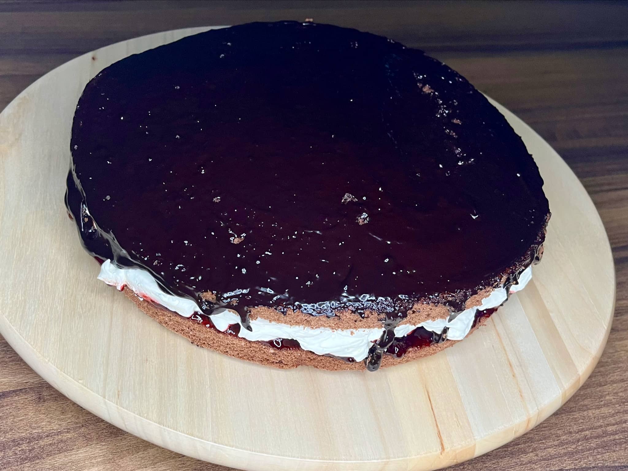 Top of the cake covered with choco topping