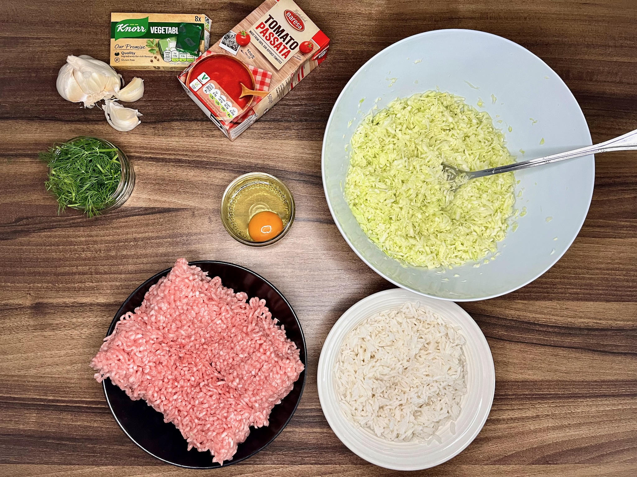 All ingredients are neatly laid out on the kitchen countertop, ready to be used to make No Roll Polish Gołąbki