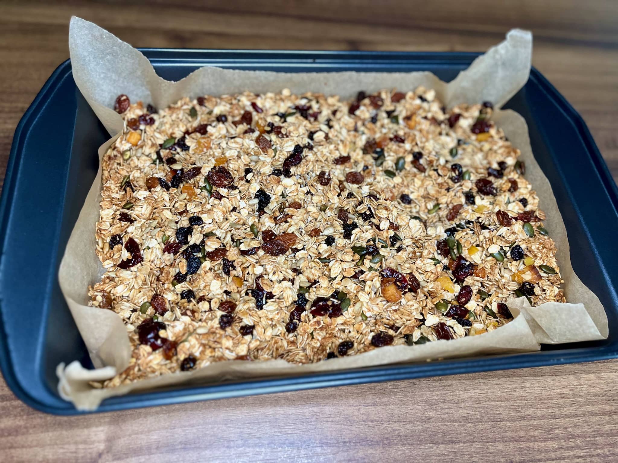 Nicely baked nut-free homemade granola in a baking tray