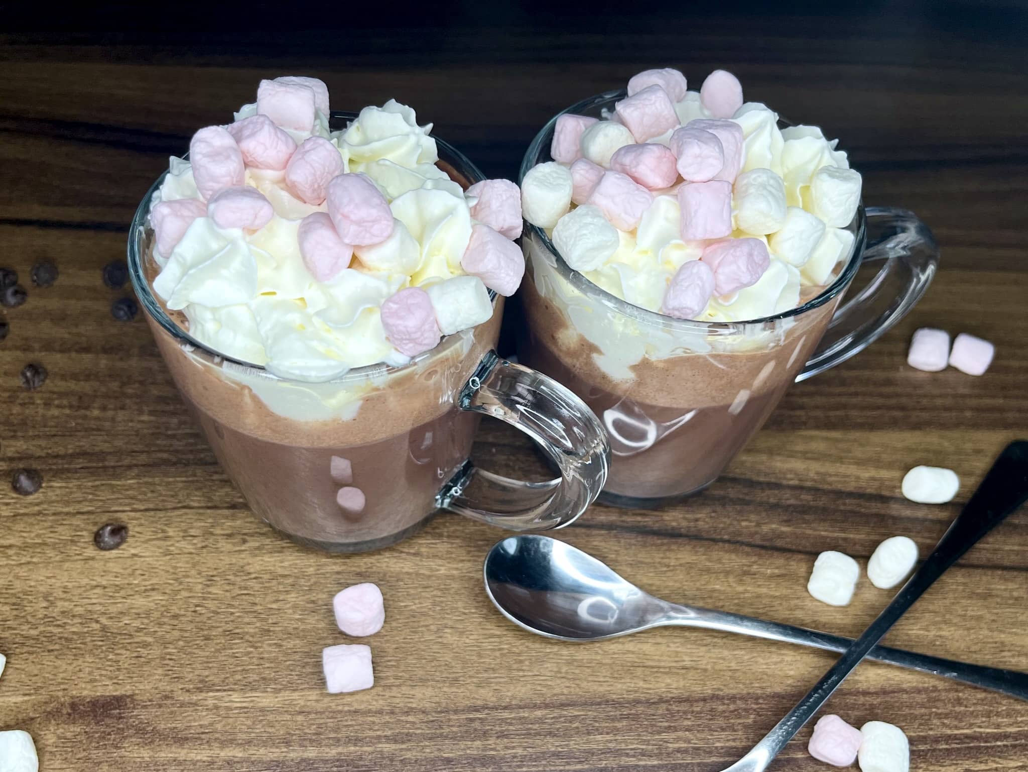 Nicely served nut-free homemade hot chocolate finished with marshmallows and squirty cream