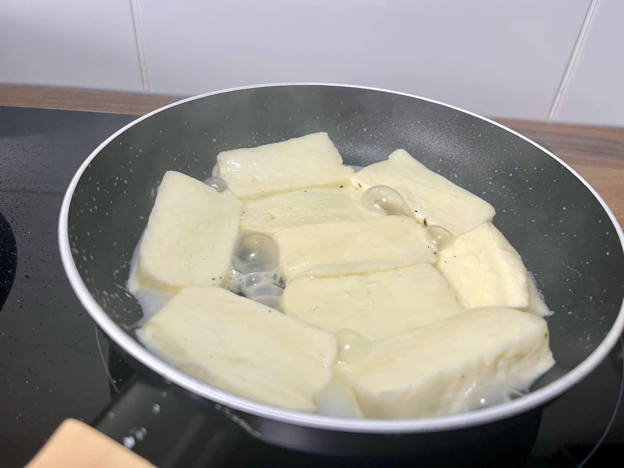 Halloumi cheese on a frying pan