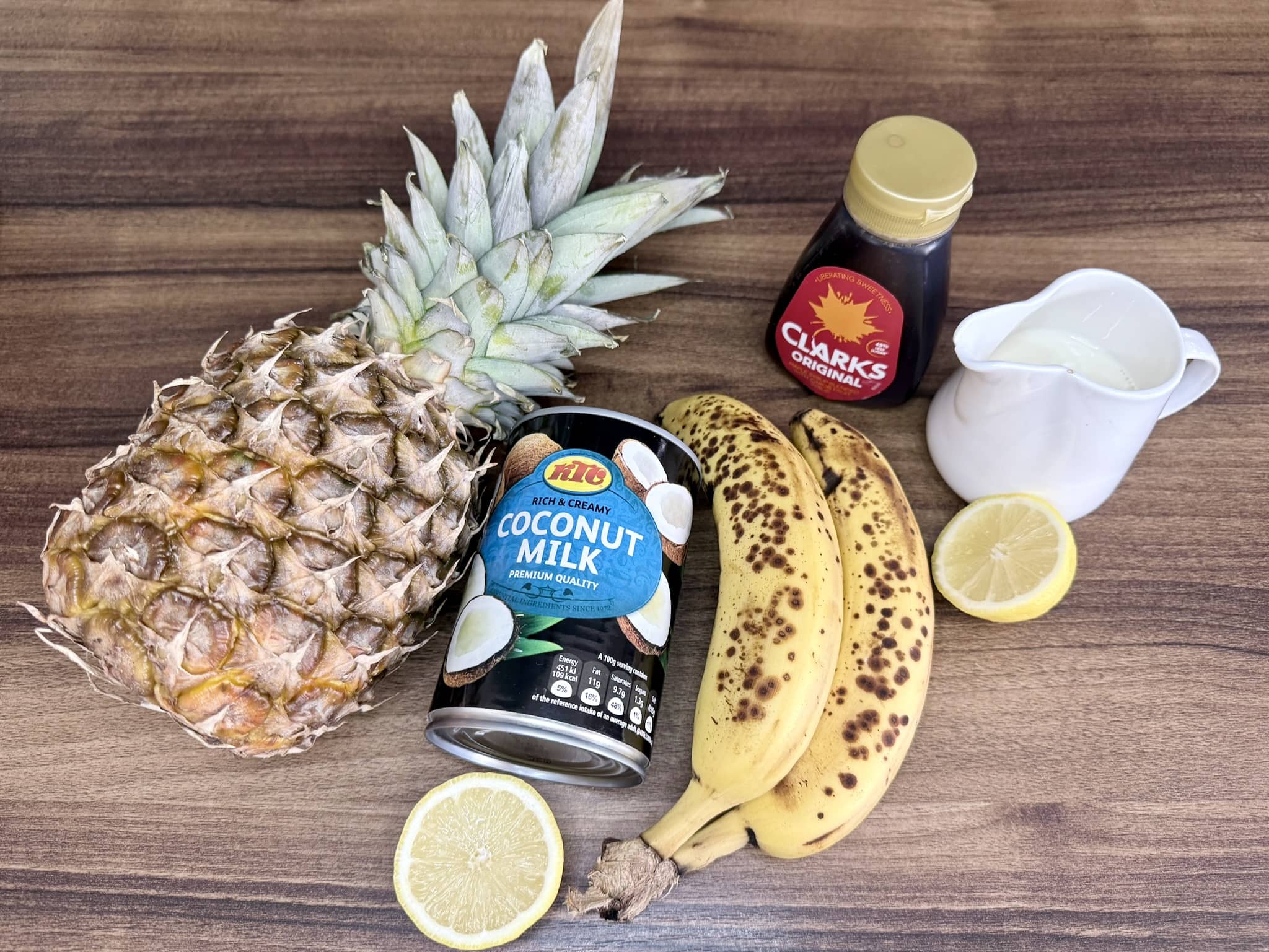All ingredients on a tabletop ready to make a Pina Colada-inspired Smoothie