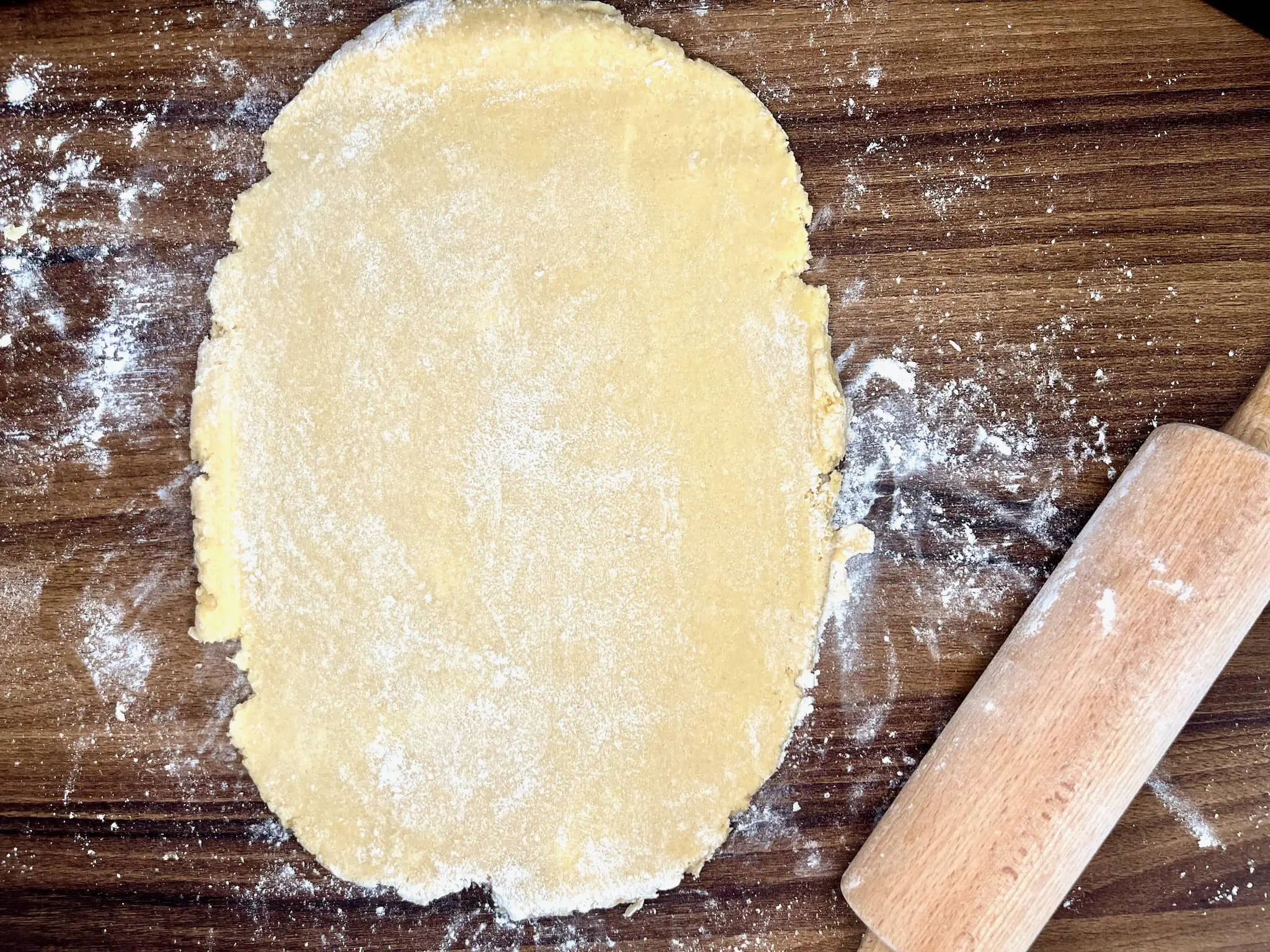 The dough was rolled out on a surface dusted with flour