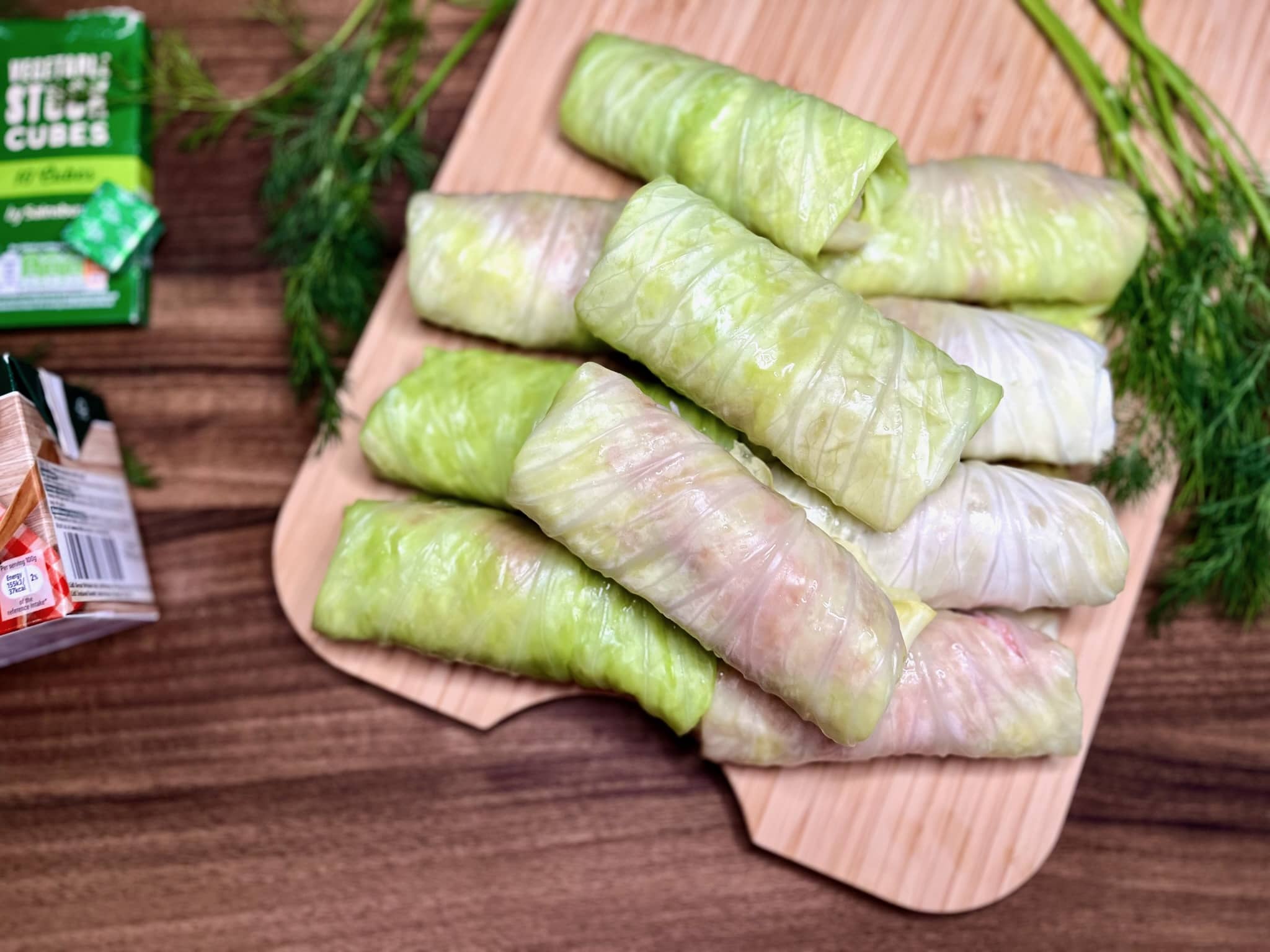Stuffed Cabbage Rolls on chopping board before cooking