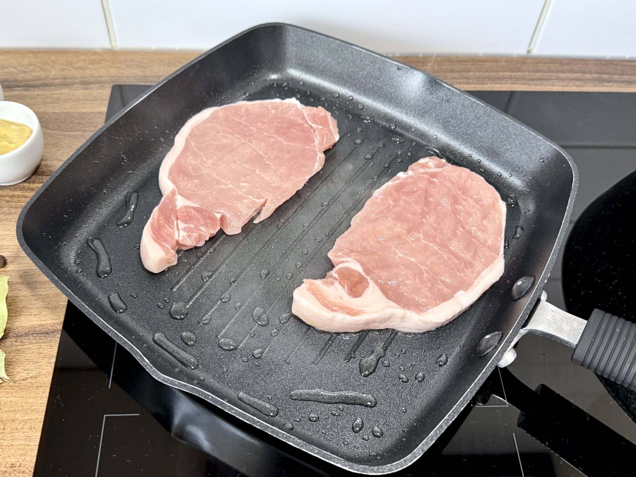 Frying pork loin in a pan