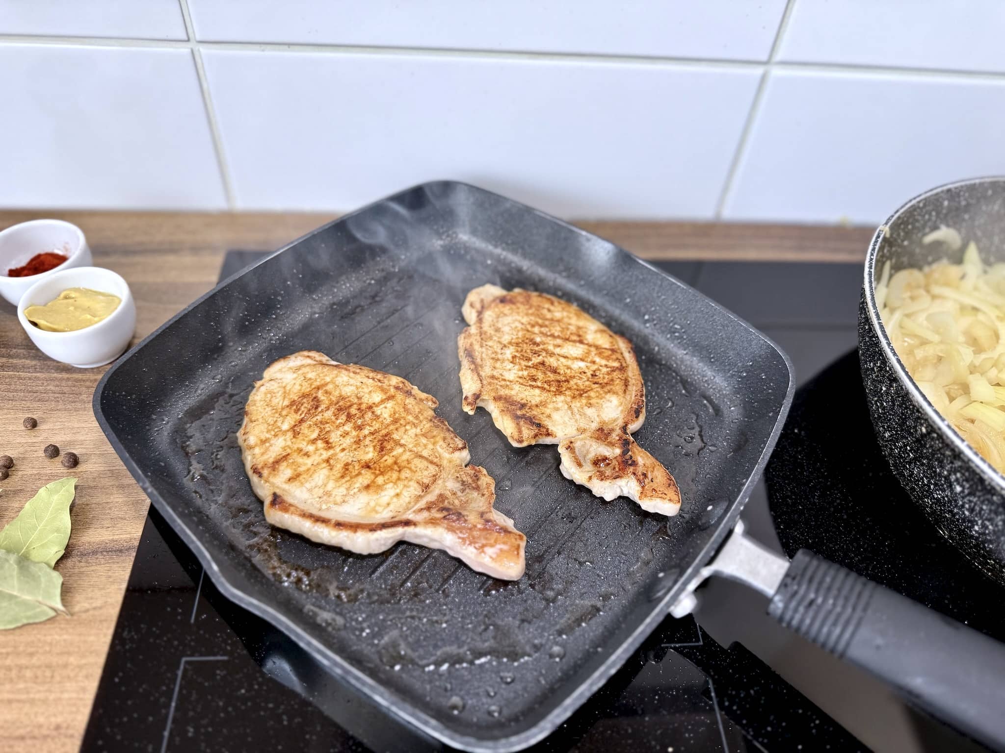 Nicely fried pork loins in a pan
