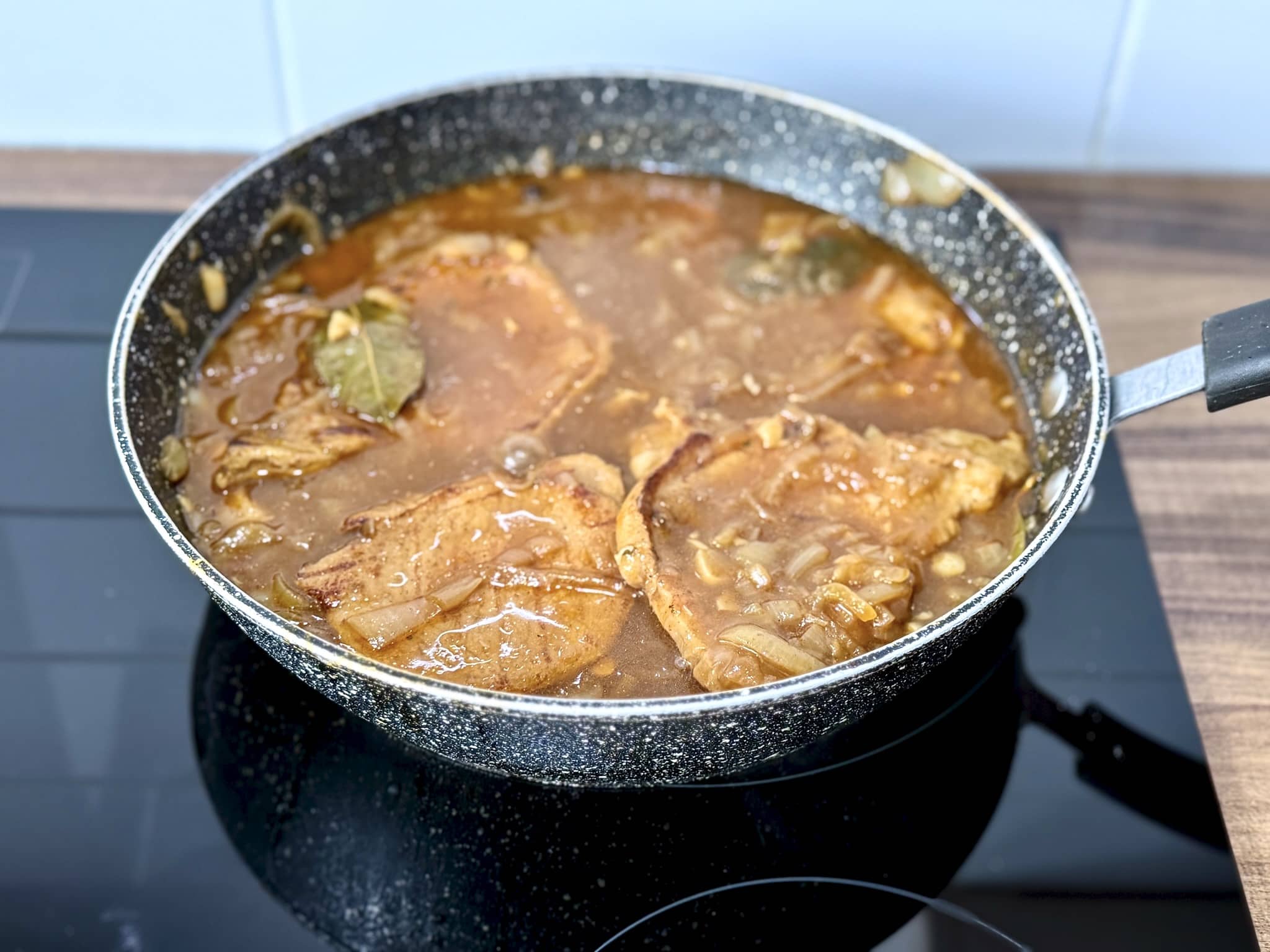 Ready Pork Chops in Onion Sauce in a pan