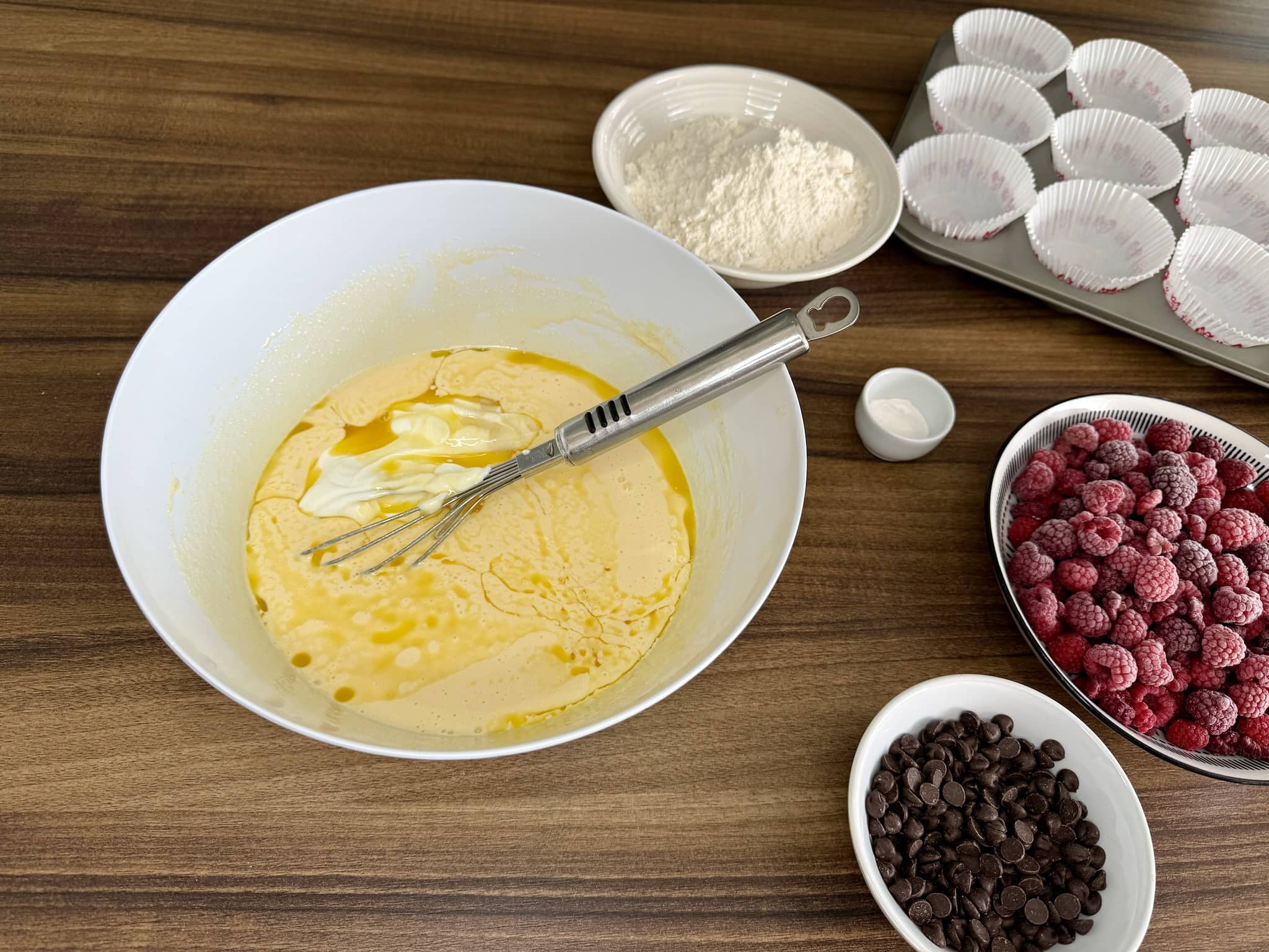 Adding butter to the mixture and continue mixing