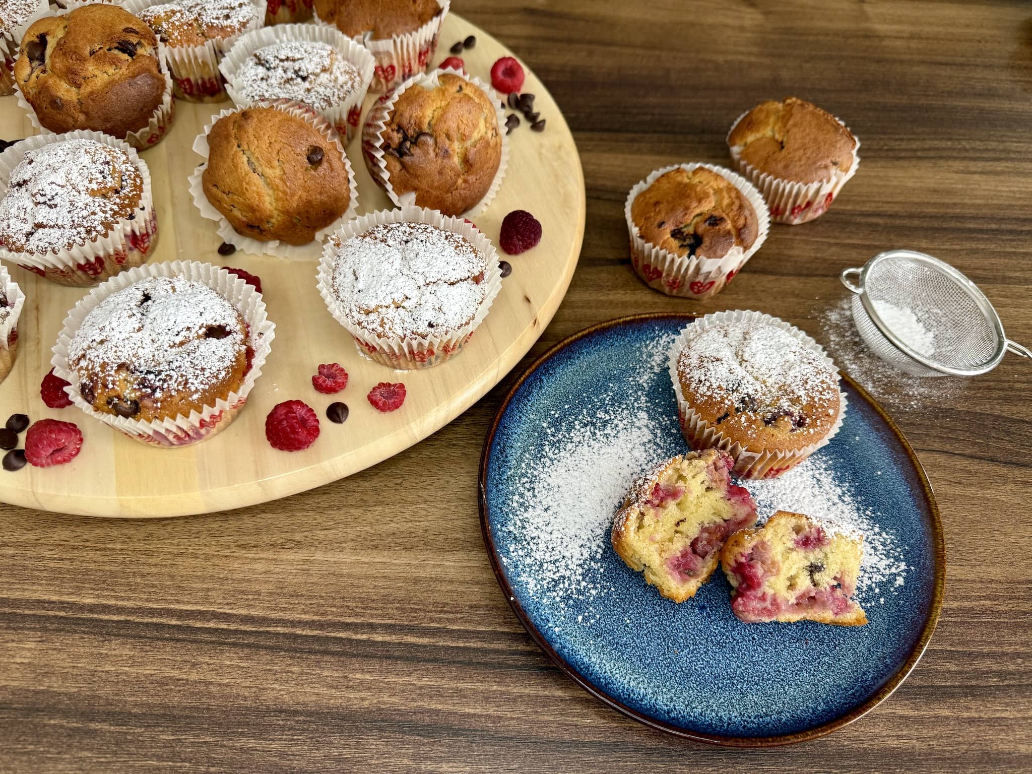 Ready muffins nicely presented on a board and plate