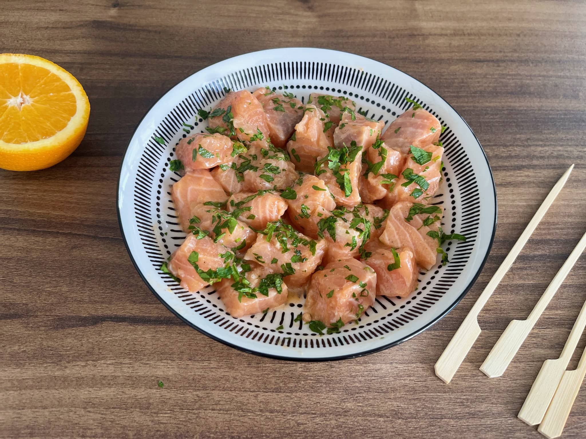 Marinated cubes of salmon in a bowl