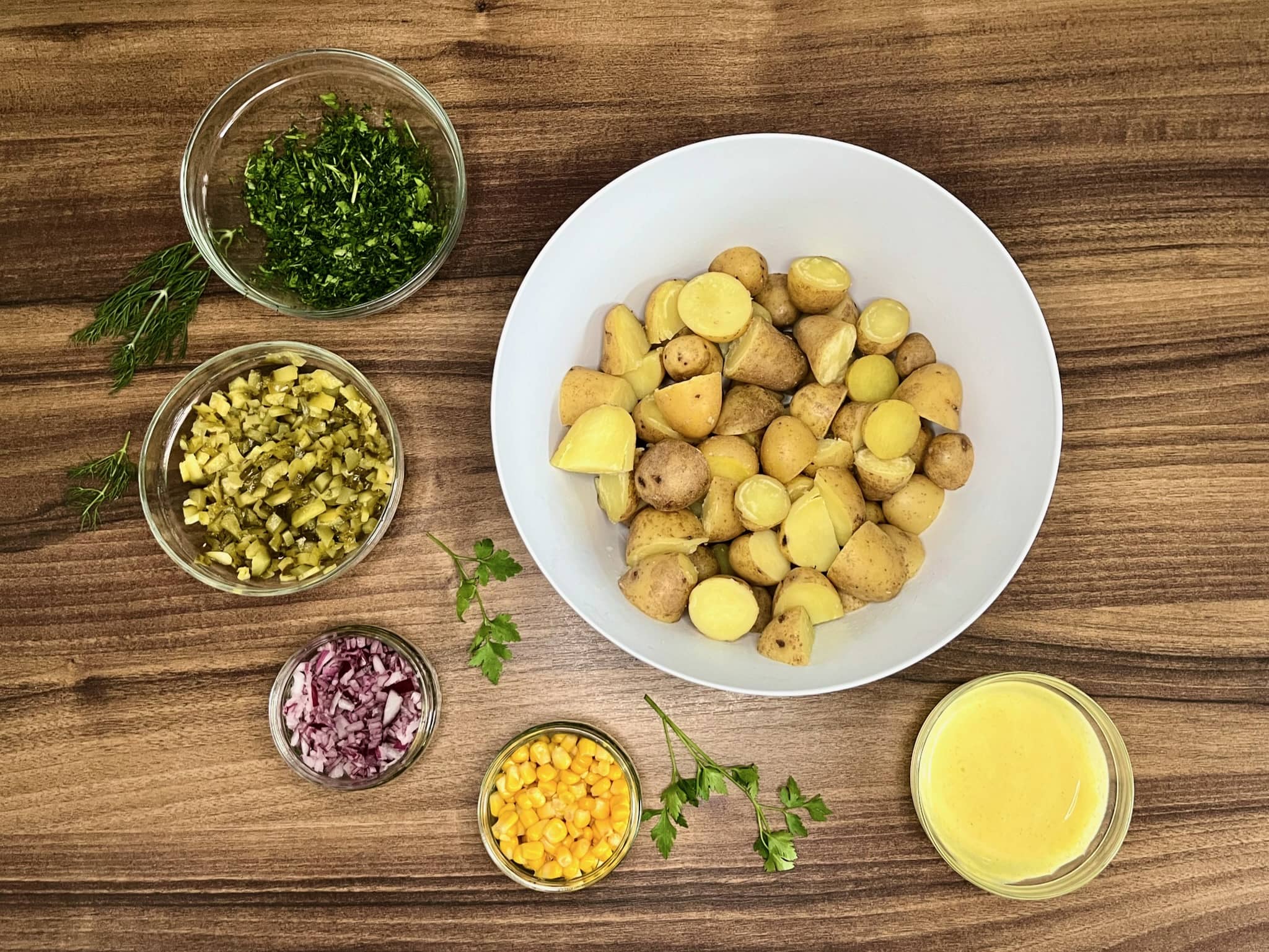 All ingredients prepped on the table, ready to make Simple Baby Potato Salad