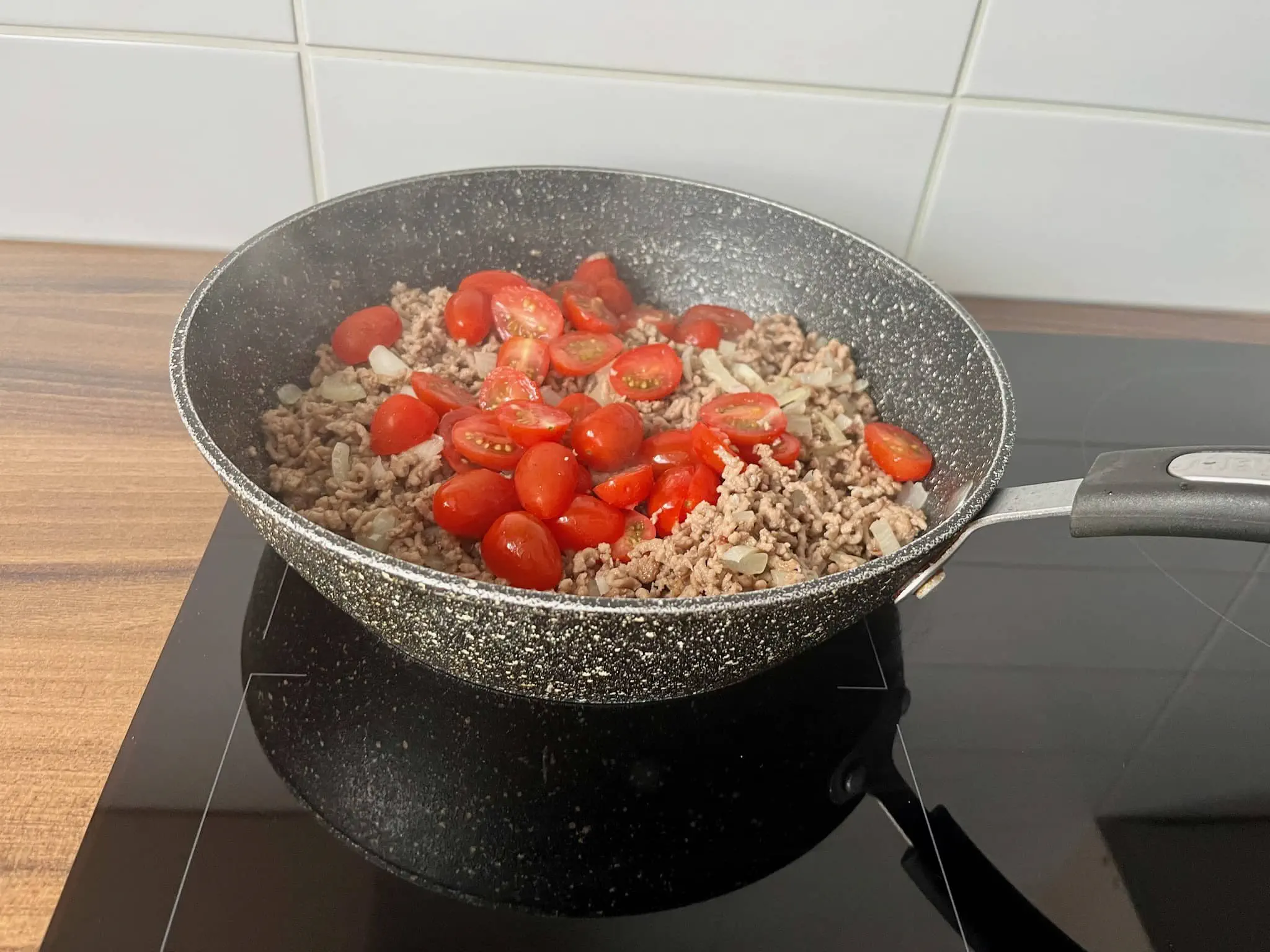 Mince meat with onion, garlic and added plum tomatoes.