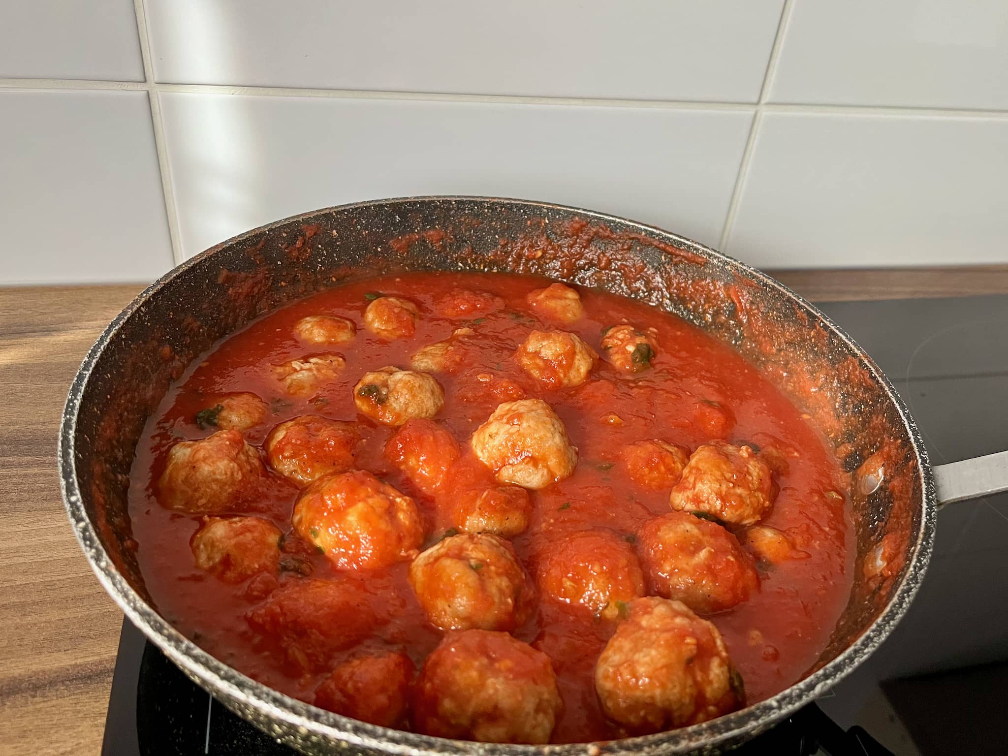 Spaghetti Meatballs - cooking in the sauce