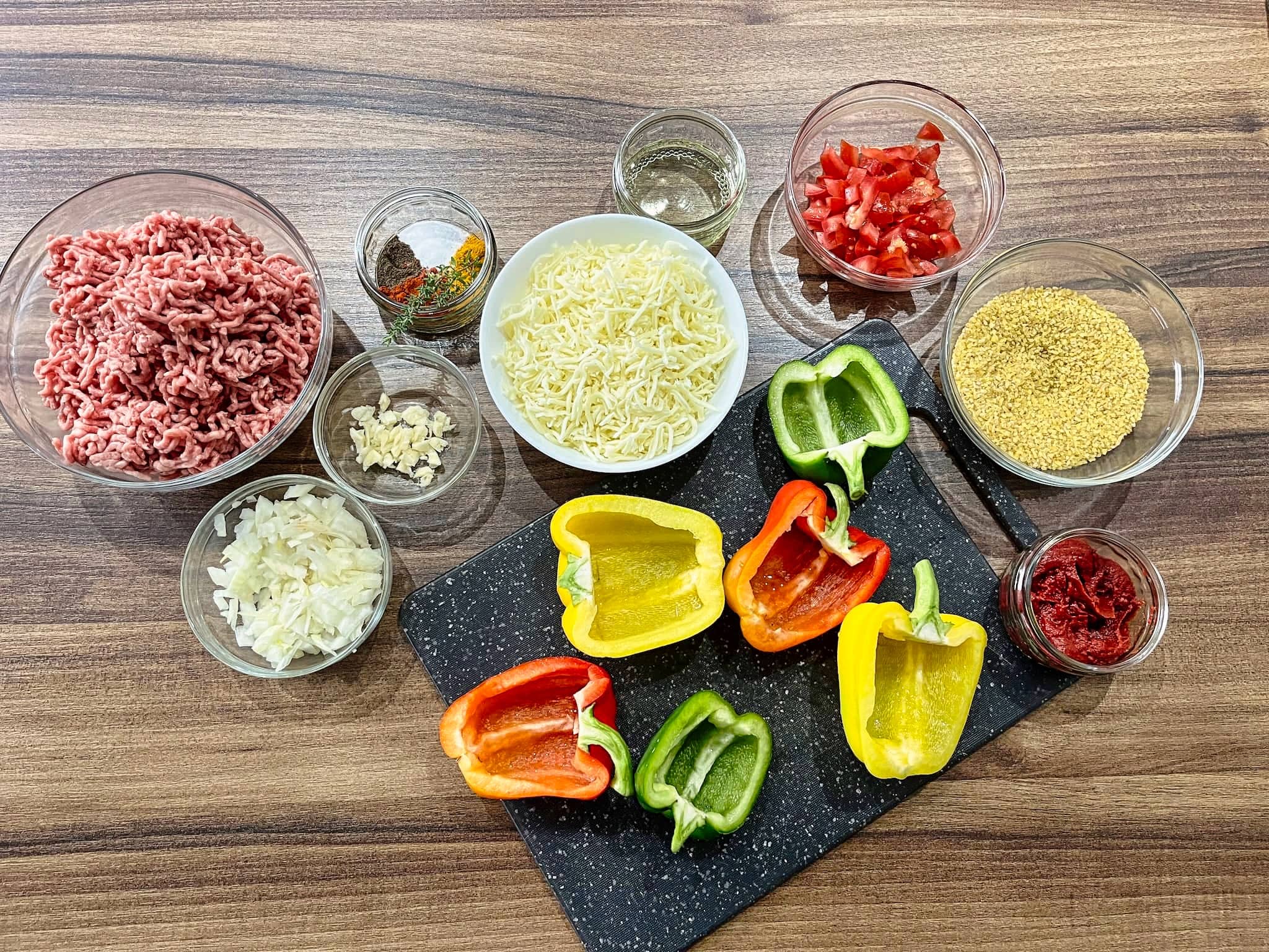 All the ingredients ready on a table top to make stuffed peppers