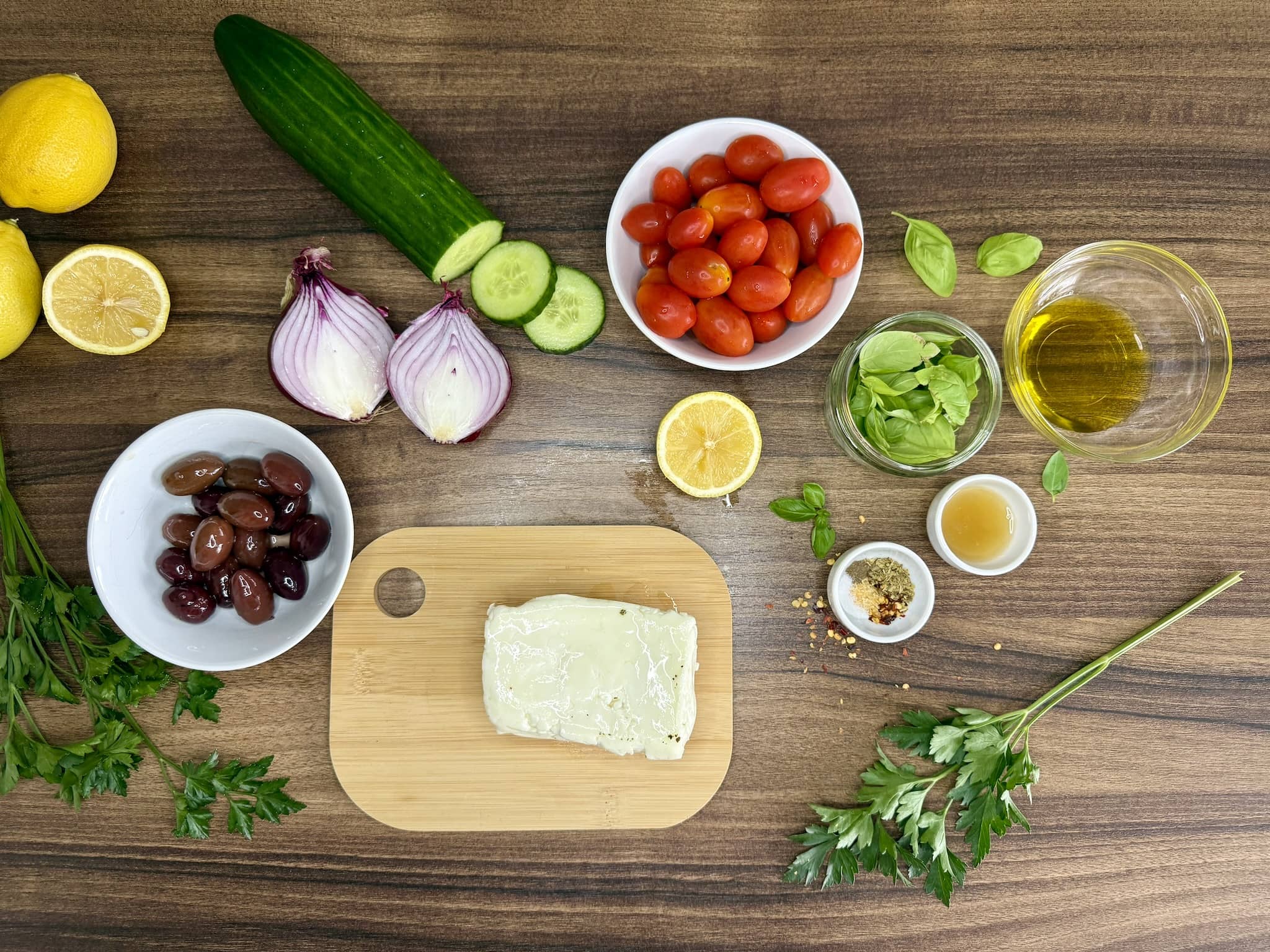 All ingredients on a tabletop ready to make a Summer Halloumi Salad