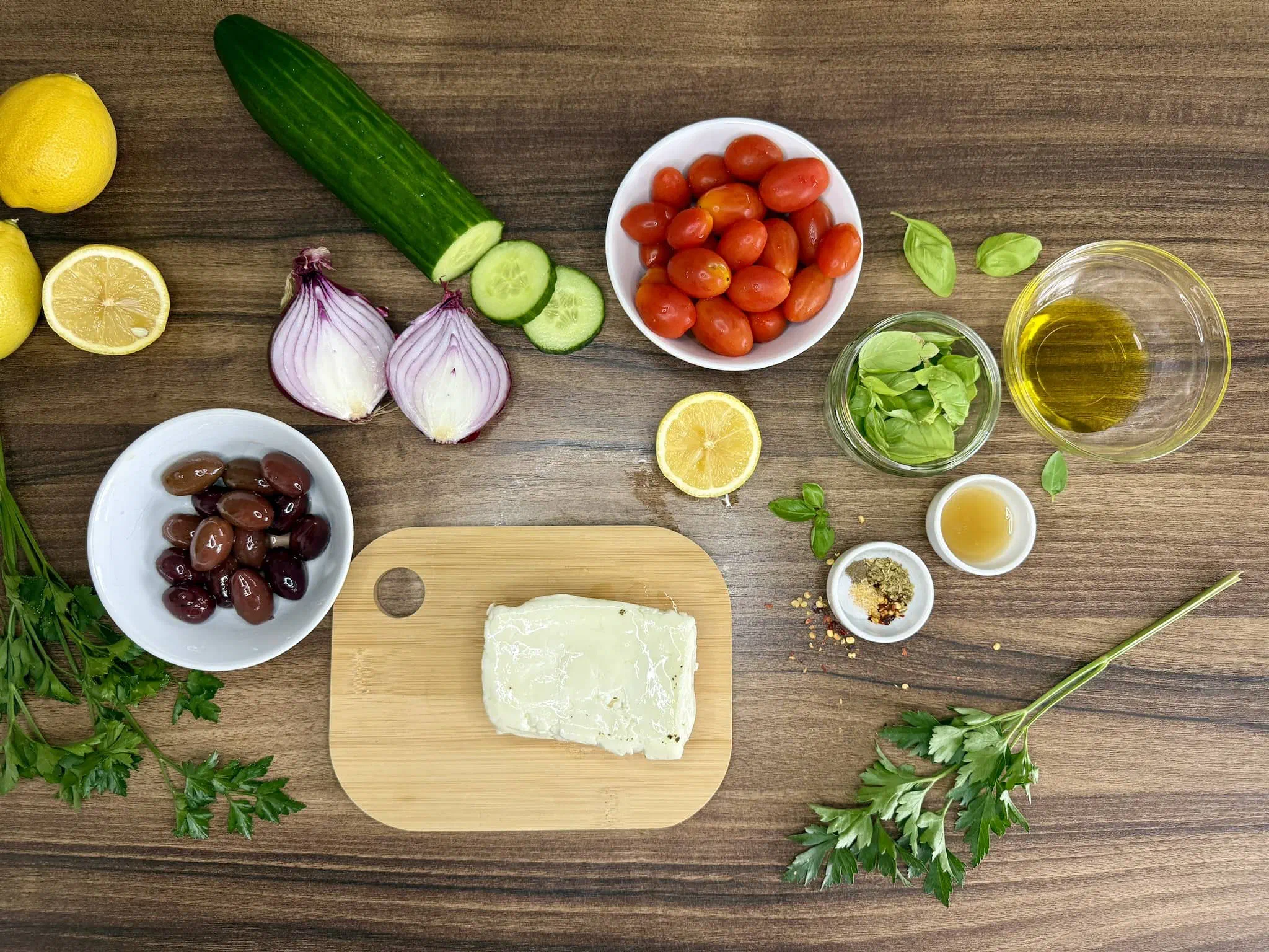 All ingredients on a tabletop ready to make a Summer Halloumi Salad