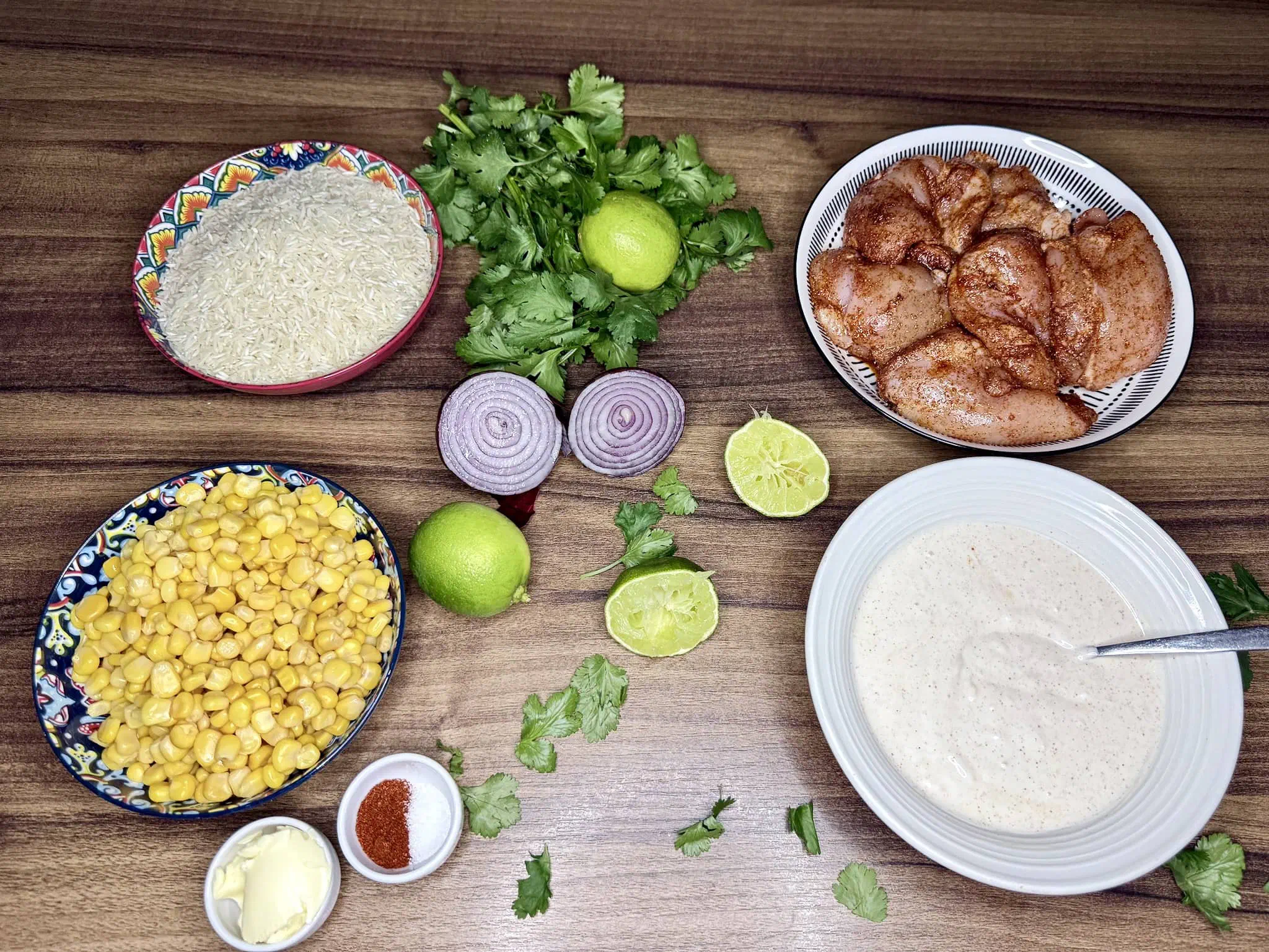 Fully prepped ingredients set out on a tabletop, ready for cooking the Sweetcorn and Chicken Rice Bowl