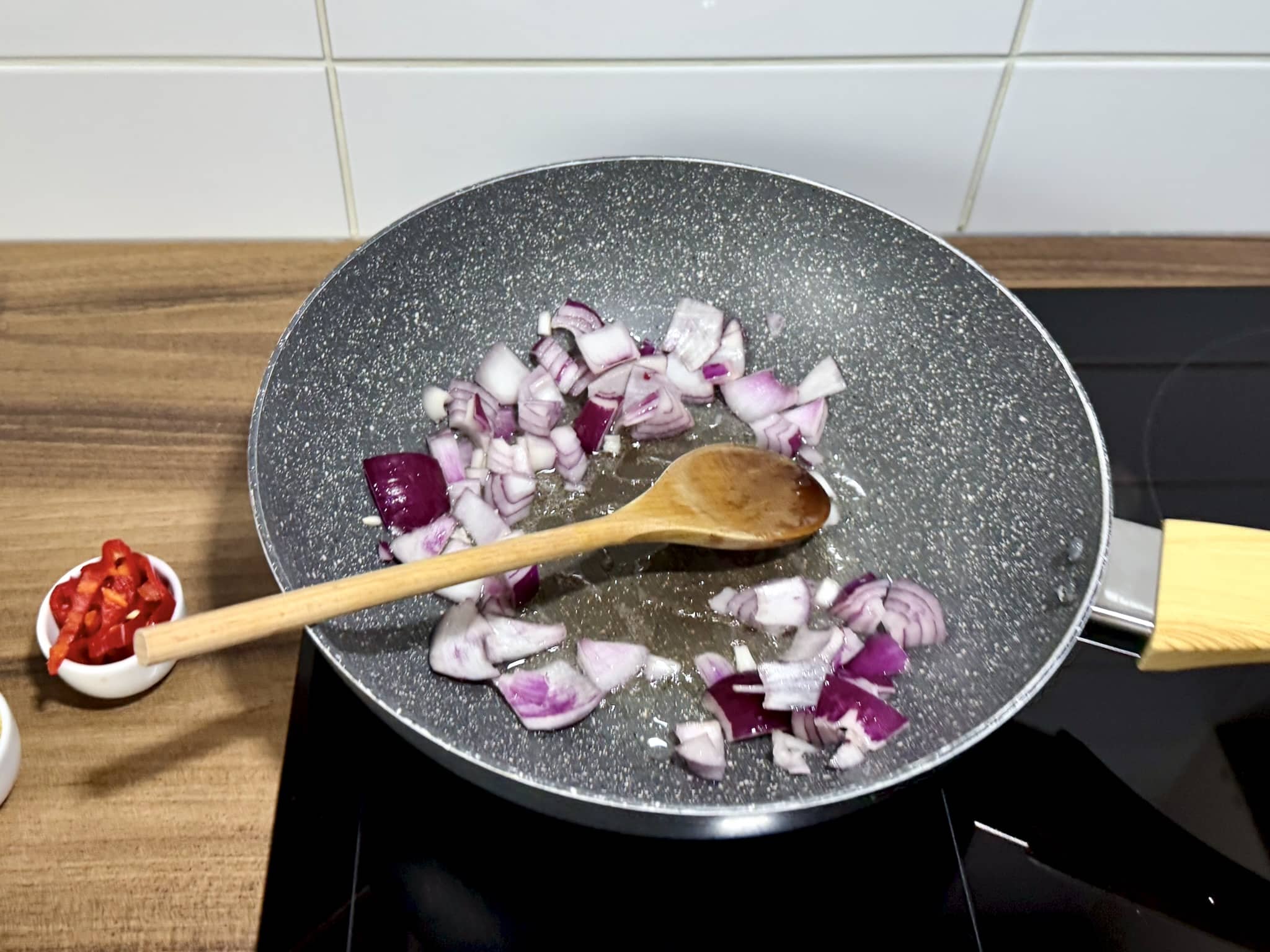 Start with frying onion in a pan
