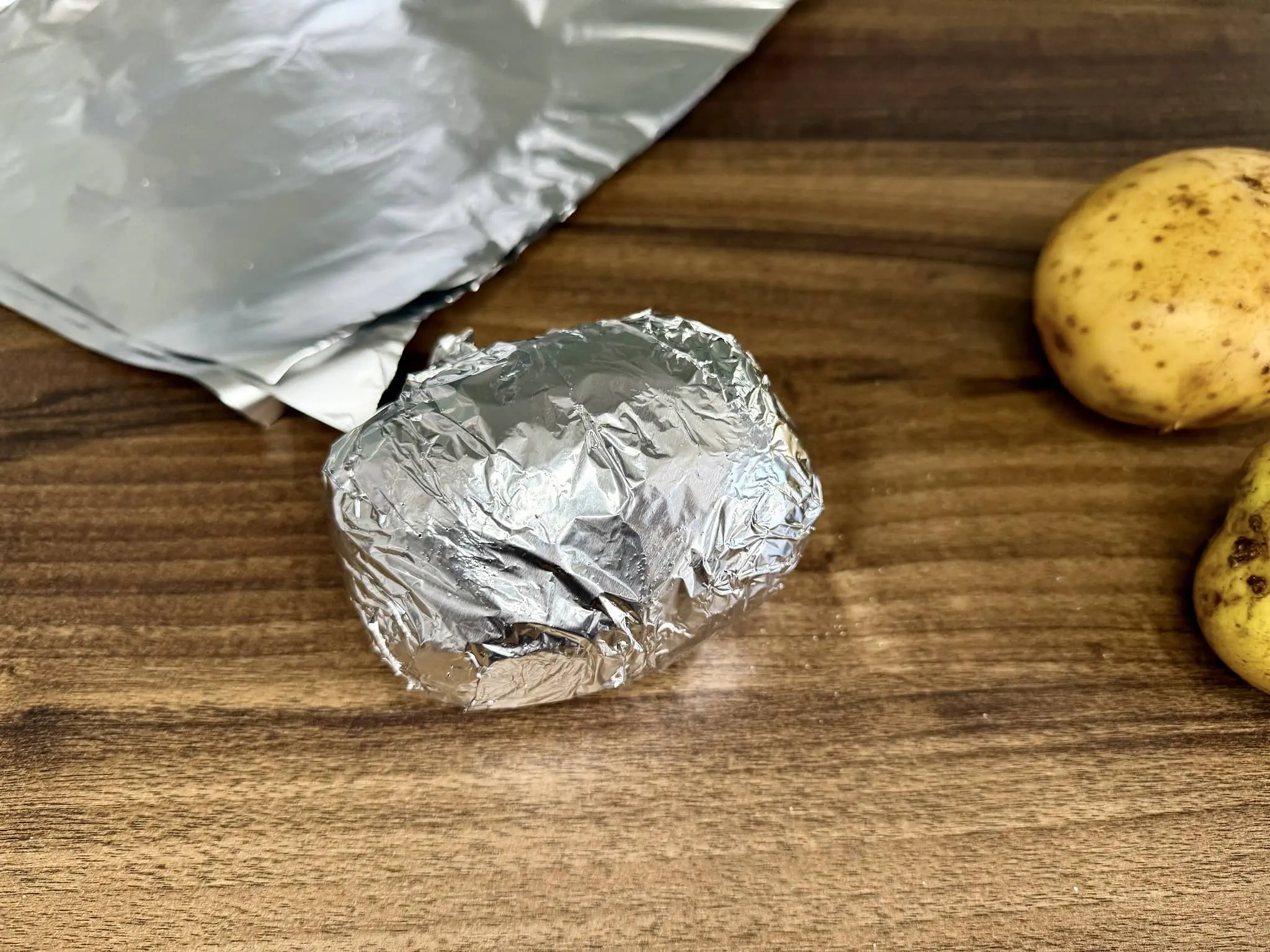 A nicely wrapped potato in tin foil